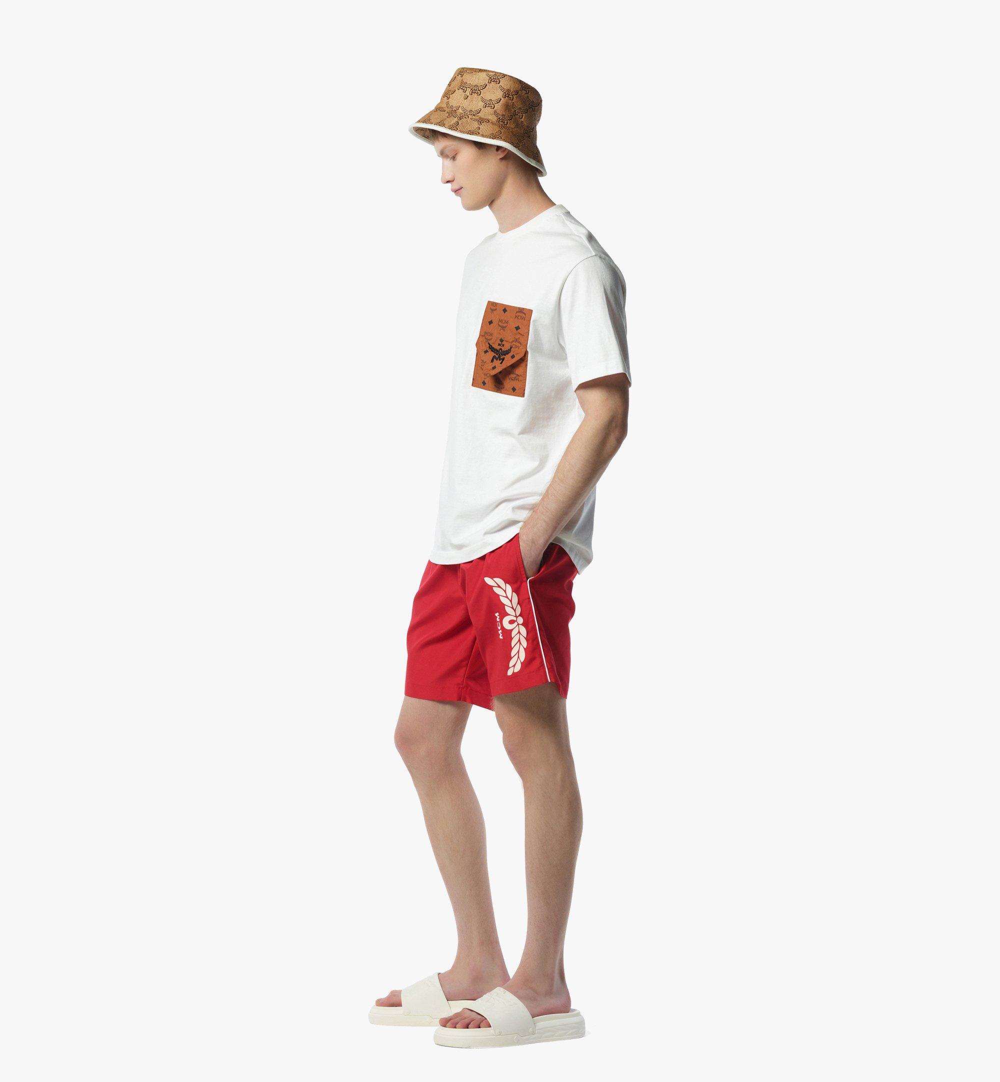 MCM Logo Print Swim Trunks Red MHWFSMM03XC2XL Plus de photos 2