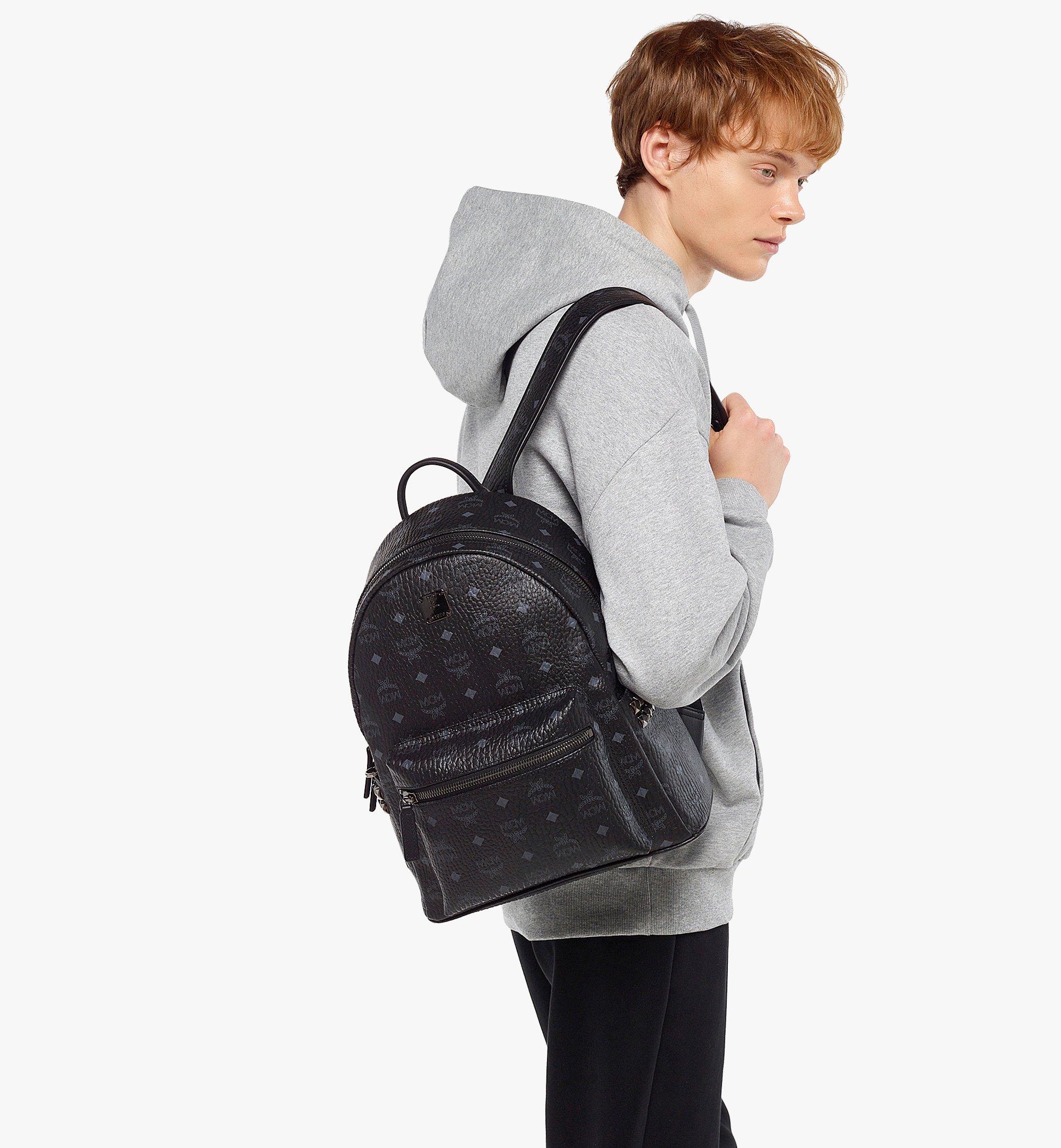 Mcm backpack silver hot sale and black