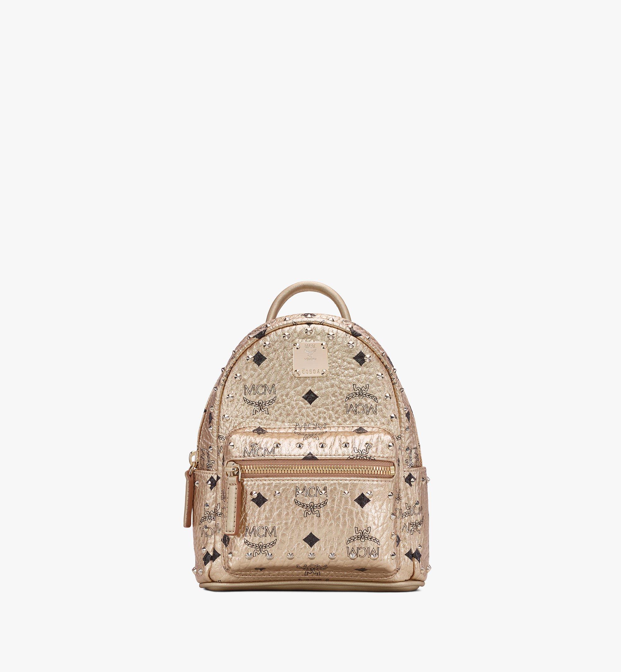 gold mcm backpack