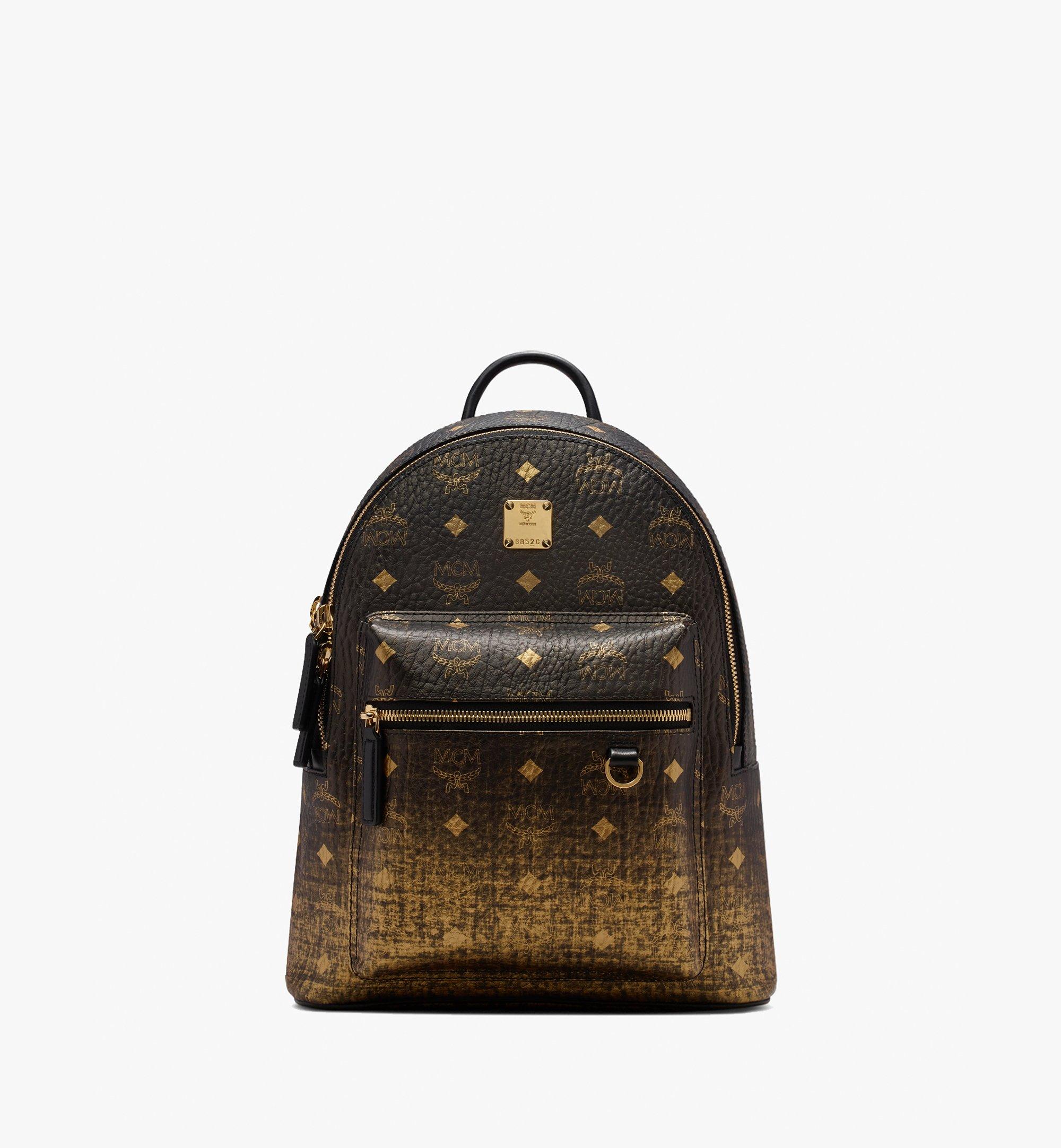 gold mcm bag