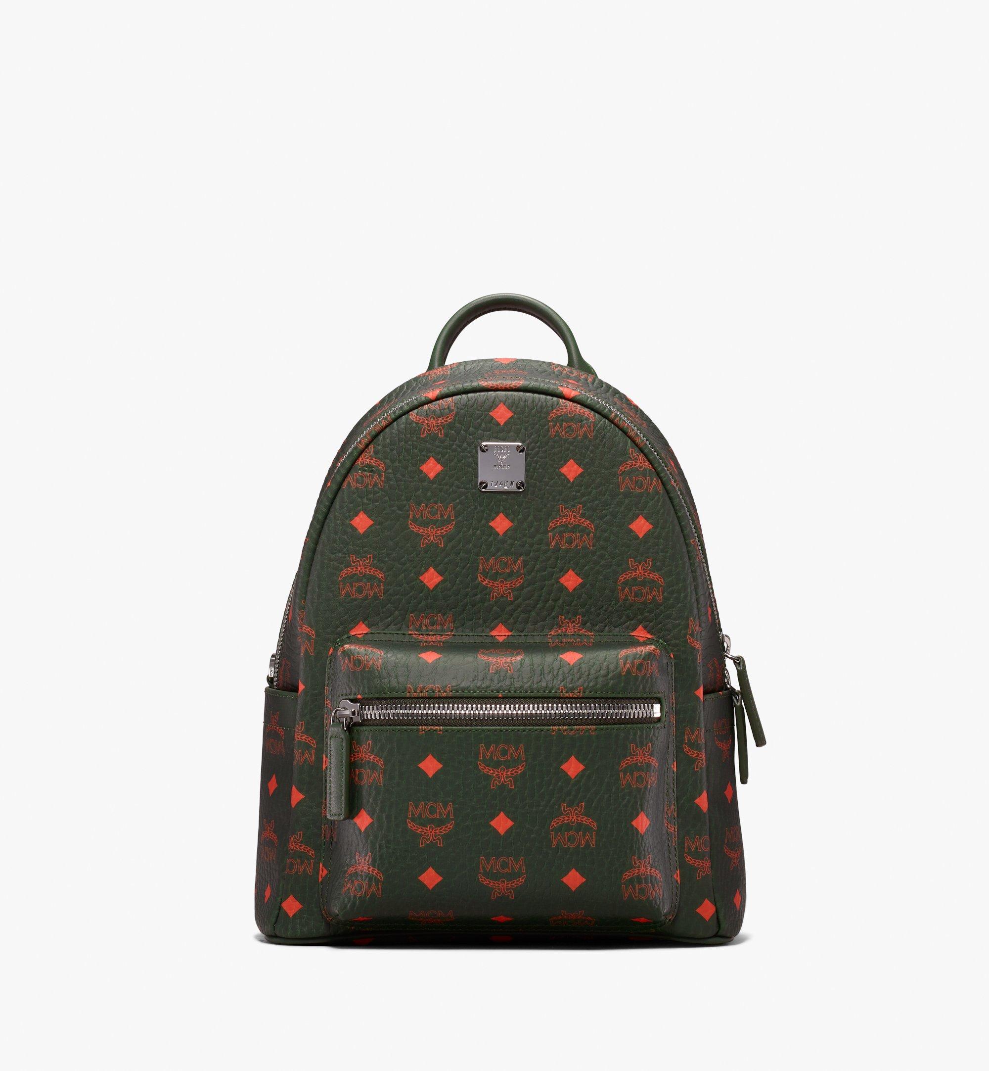 green mcm backpack