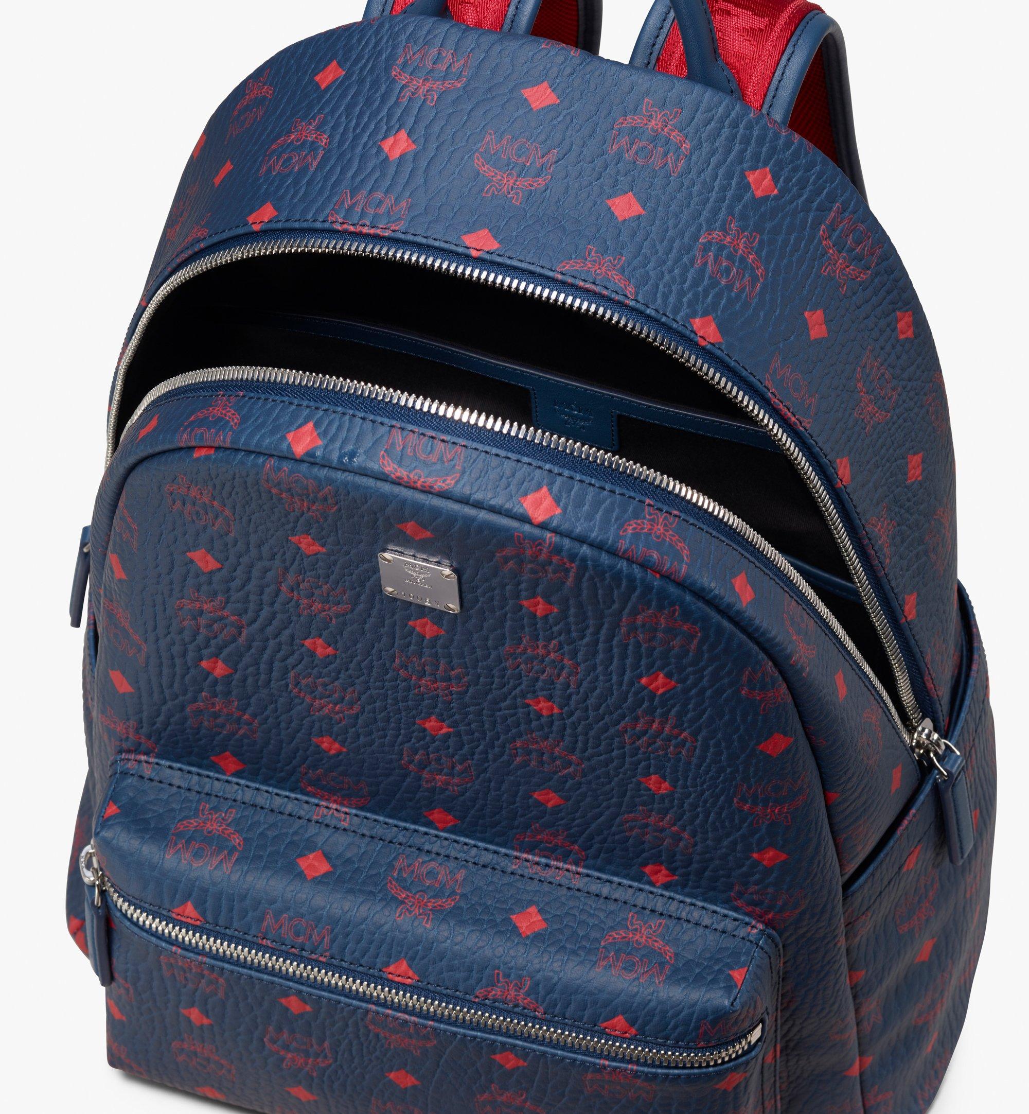 dark blue mcm backpack