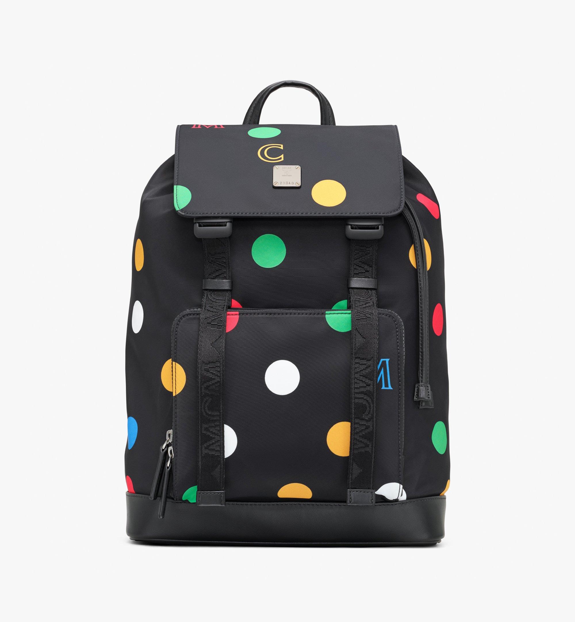black polka dot backpack