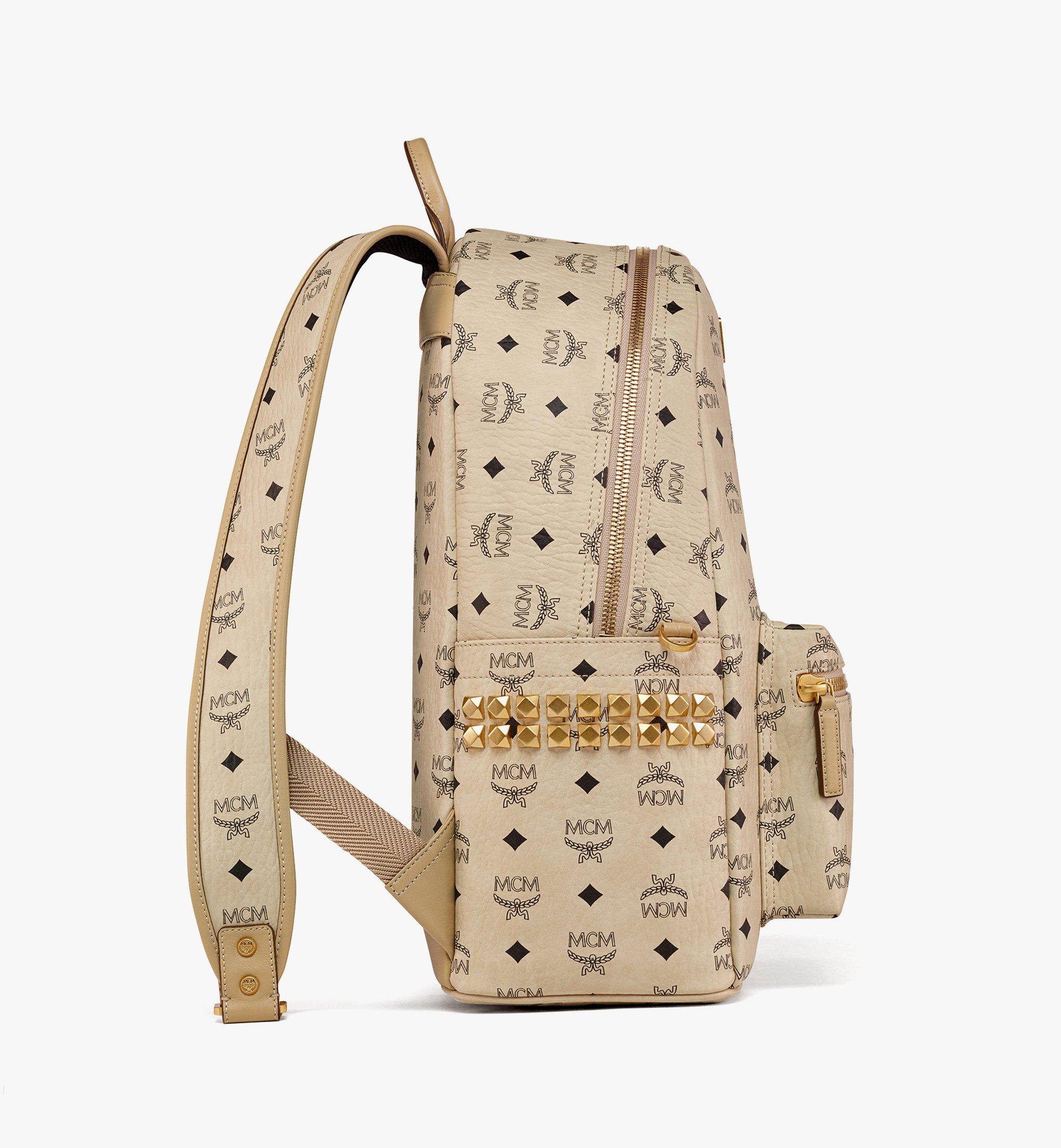 Mcm backpack gold hotsell