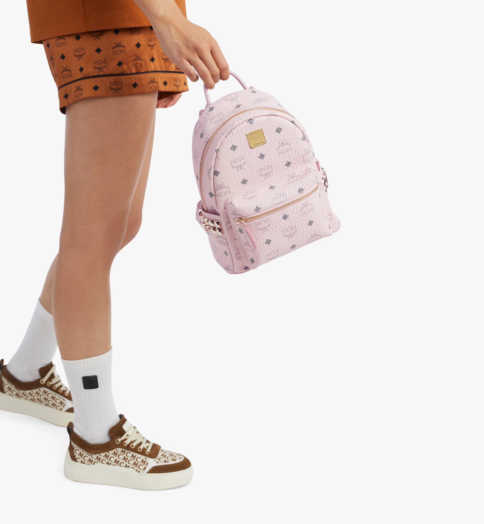 Mcm pink hotsell studded backpack