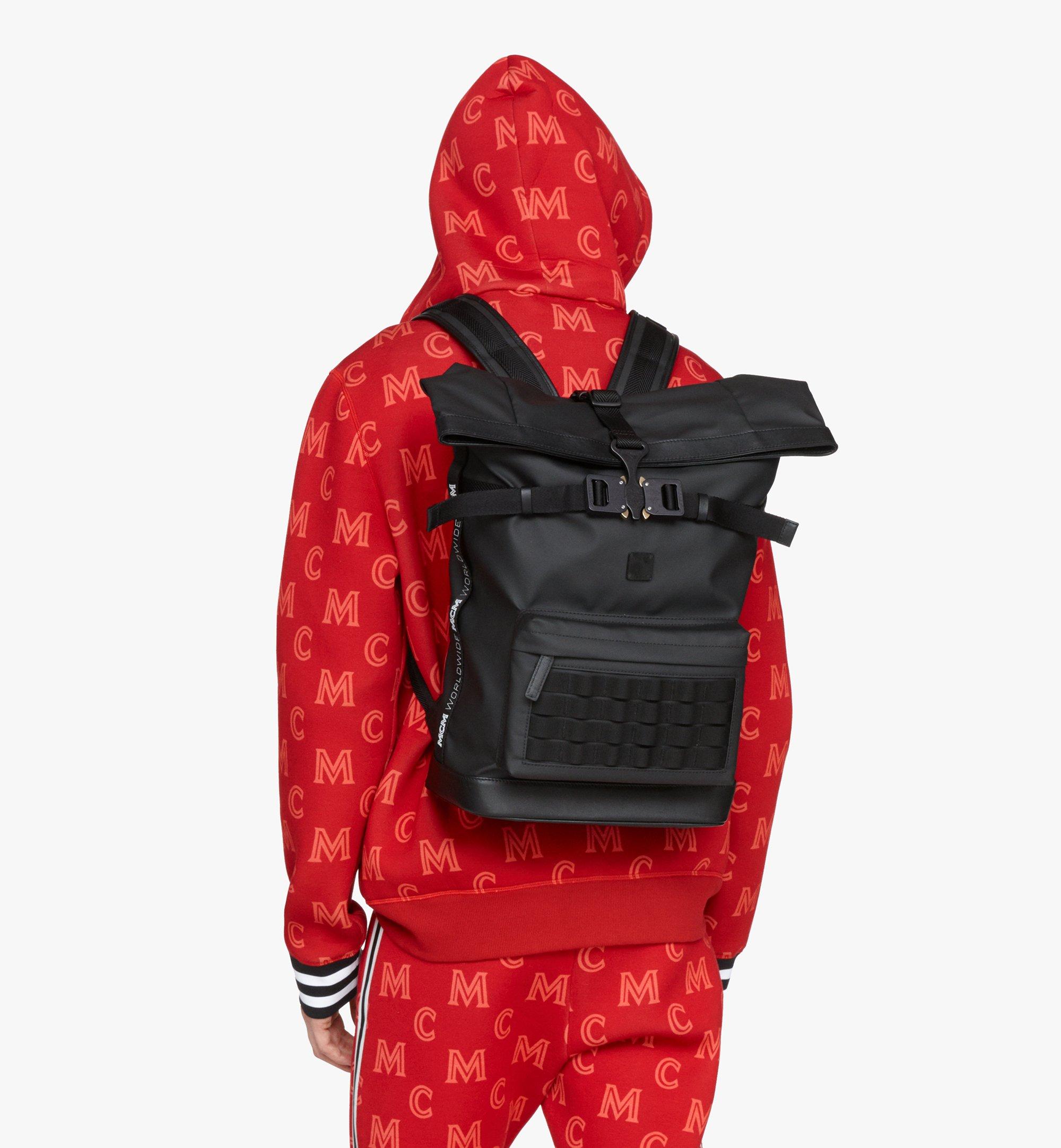 mcm red and black backpack