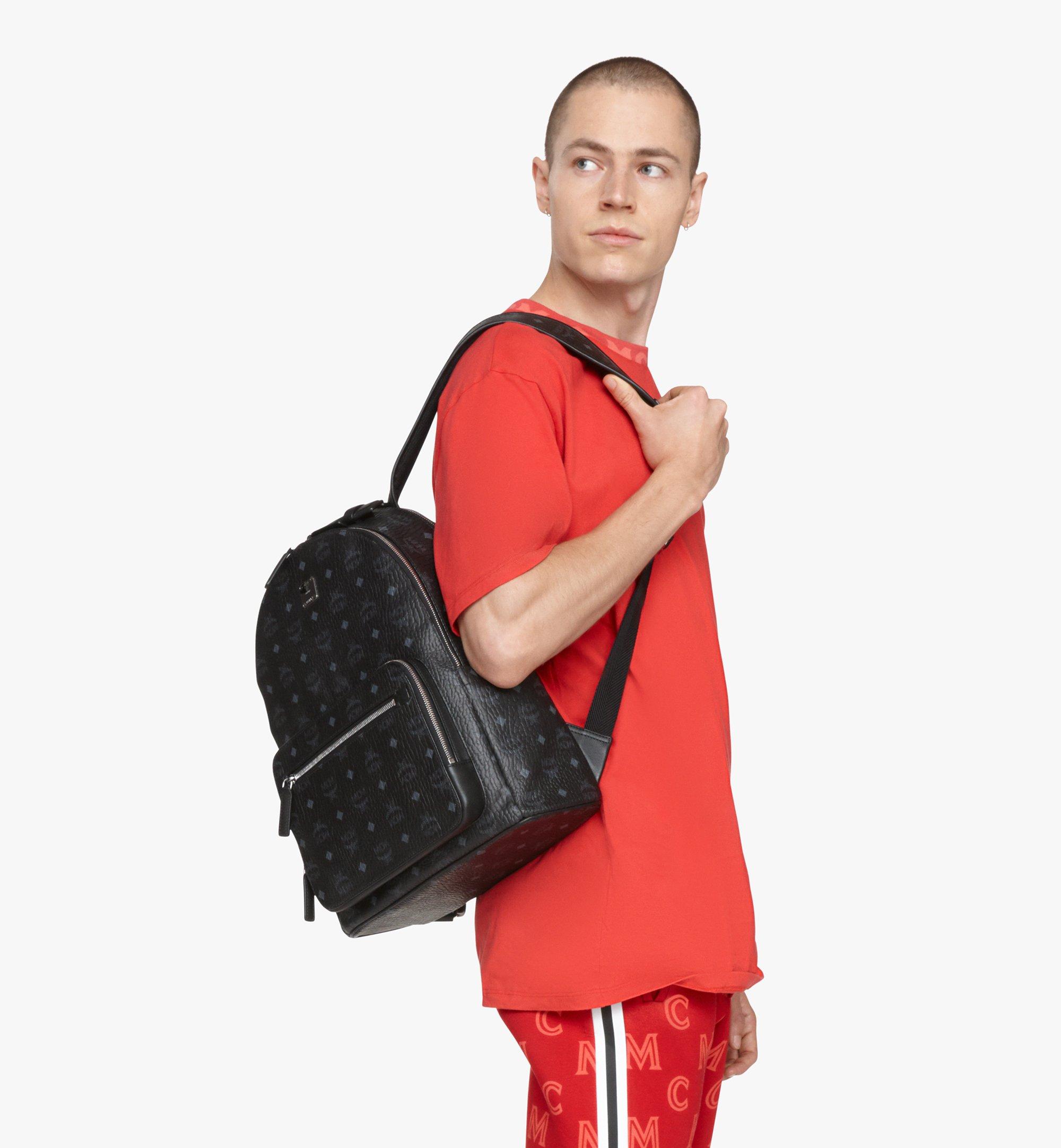 Mcm red shop and black backpack