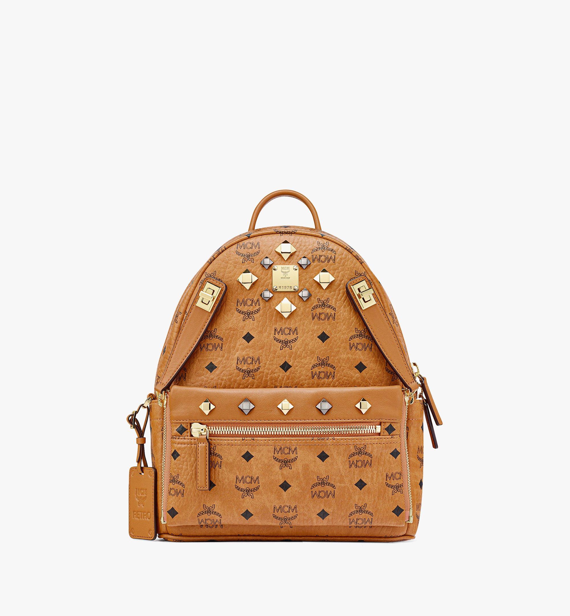 MCM Blue Coated Canvas and Leather Large Studs Stark Backpack at 1stDibs