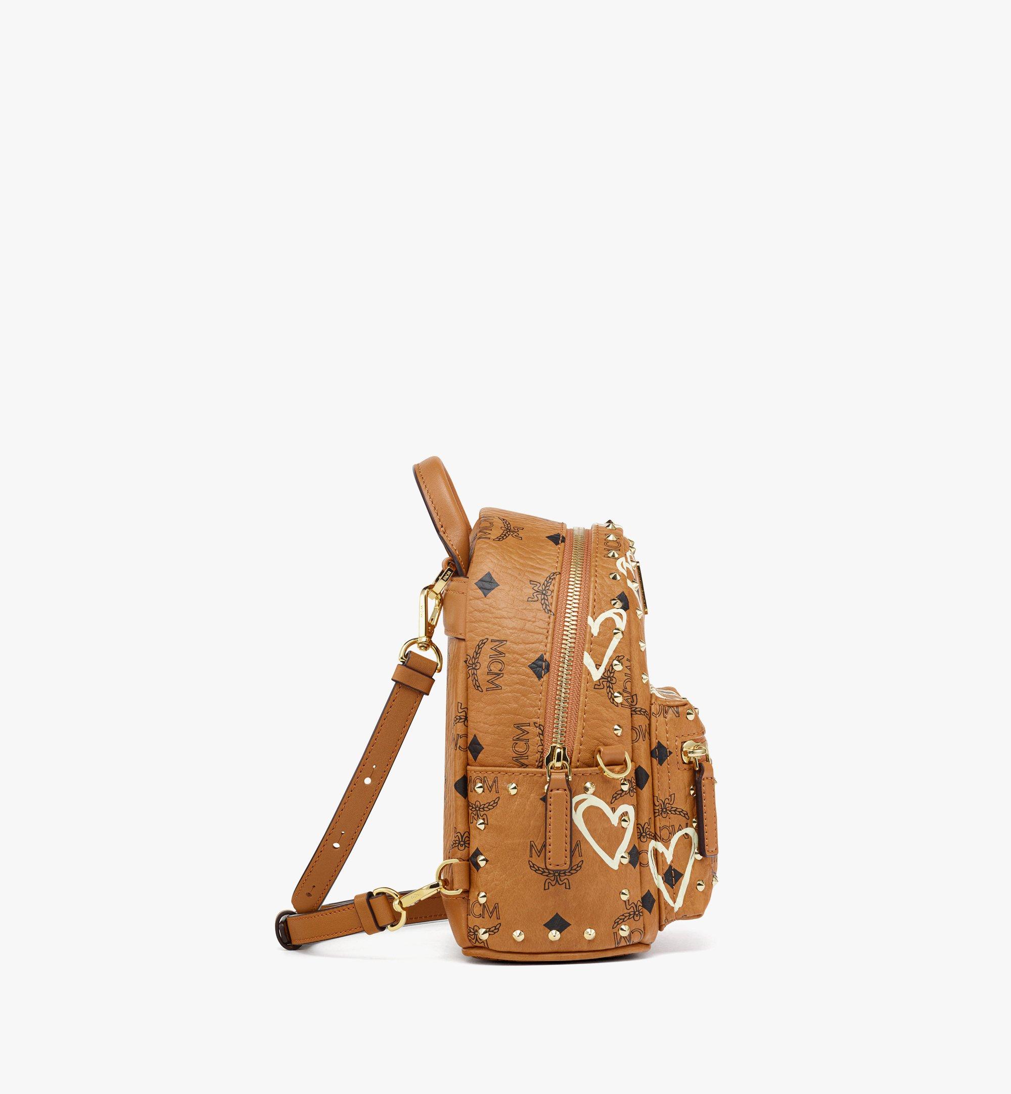 MCM Valentine’s Day Stark Bebe Boo Backpack in Studded Visetos Cognac MMKDAUP01CO001 ほかの角度から見る 1