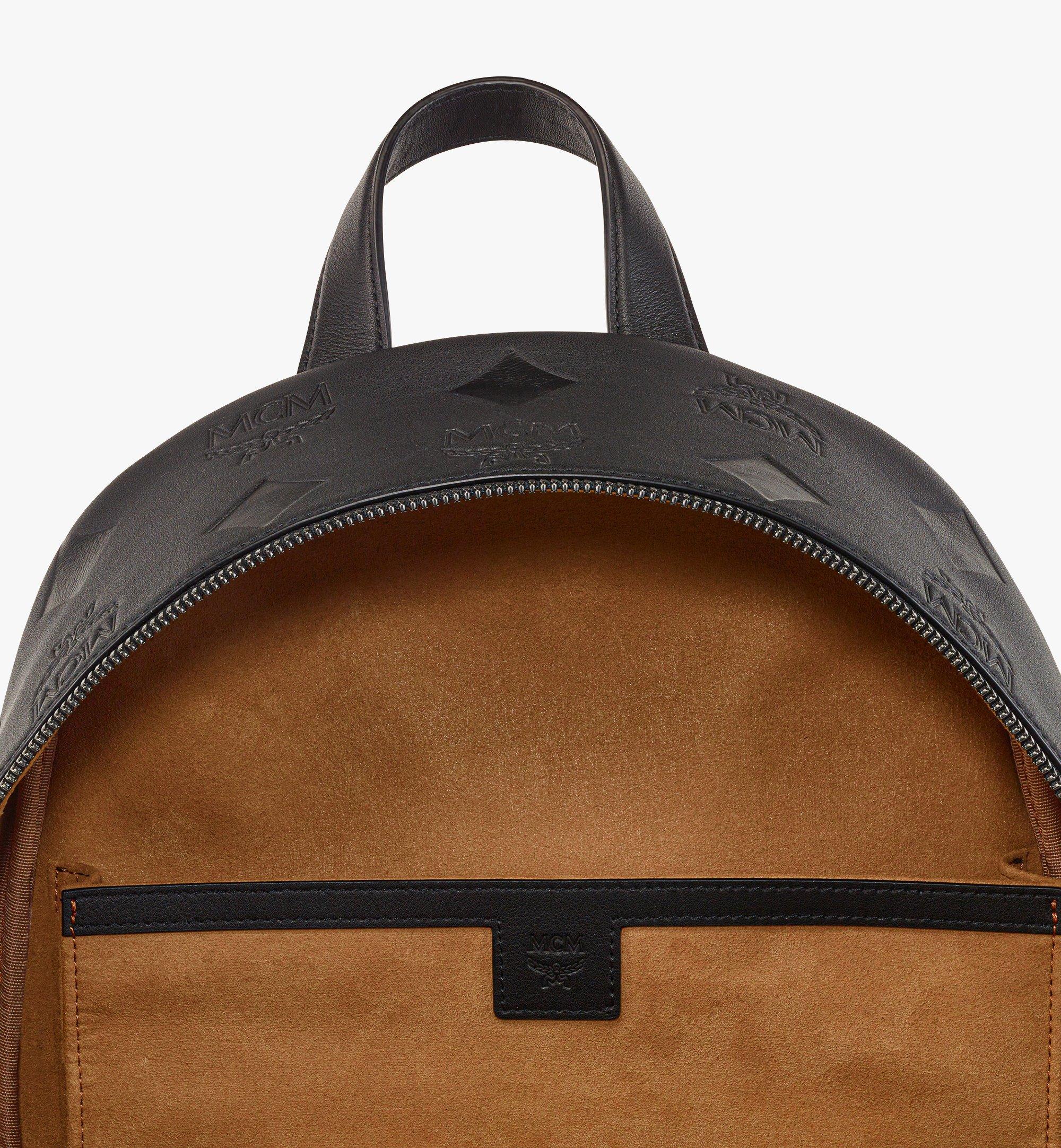 MCM Stark Monogram-print Mini Leather Backpack in Brown