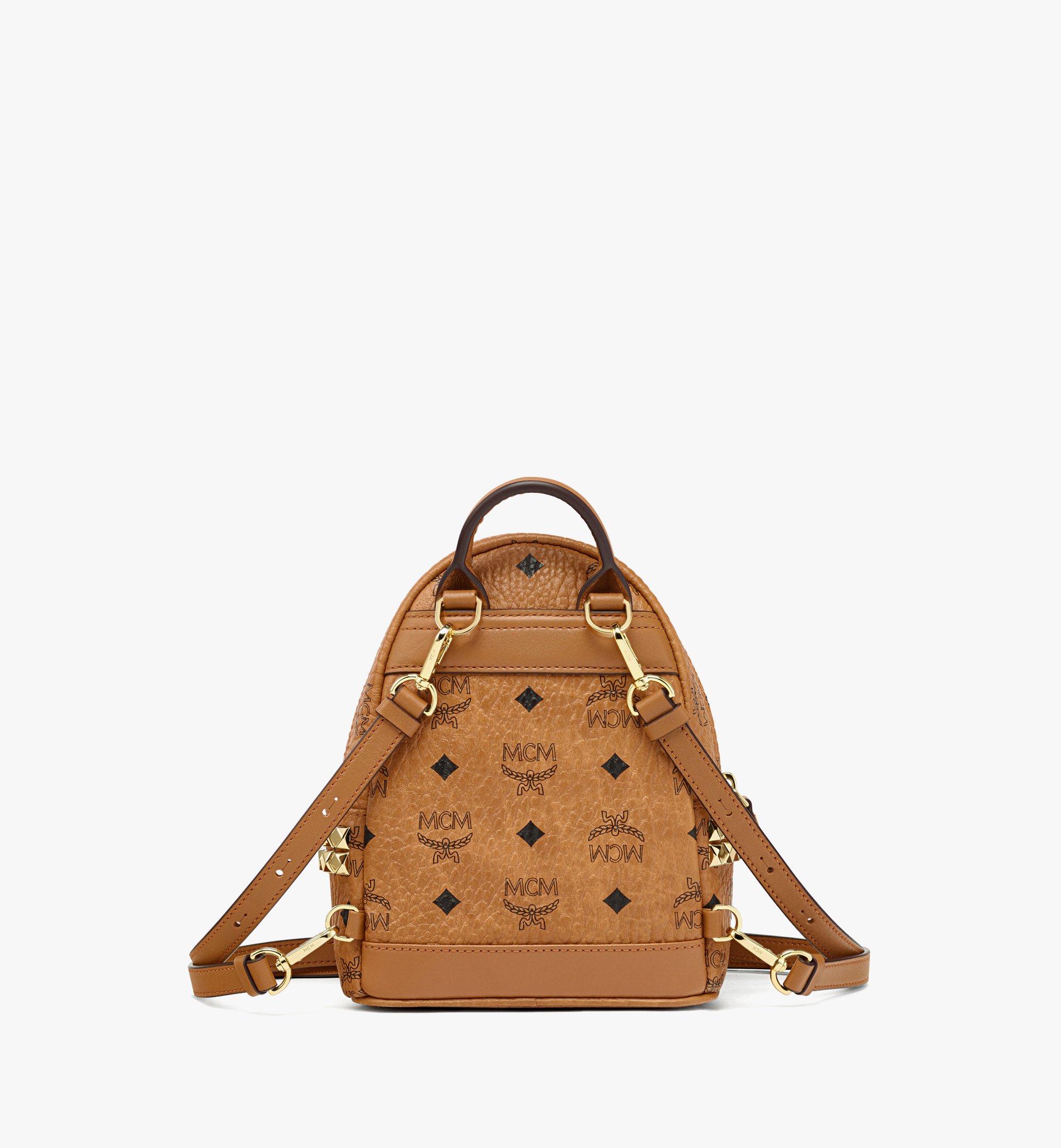 Mcm mini hot sale backpack crossbody