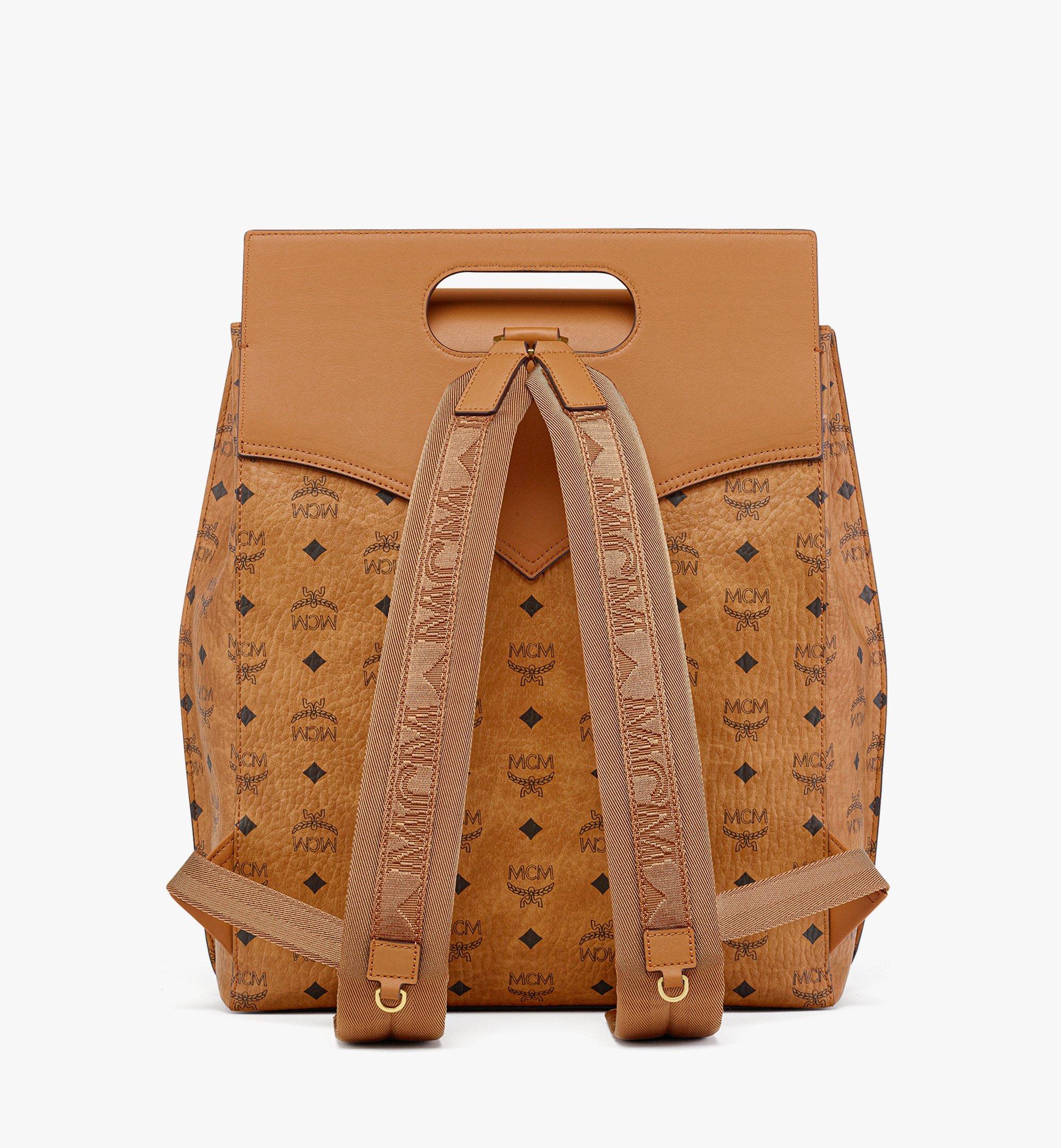 Mcm essential backpack in monogram leather sale