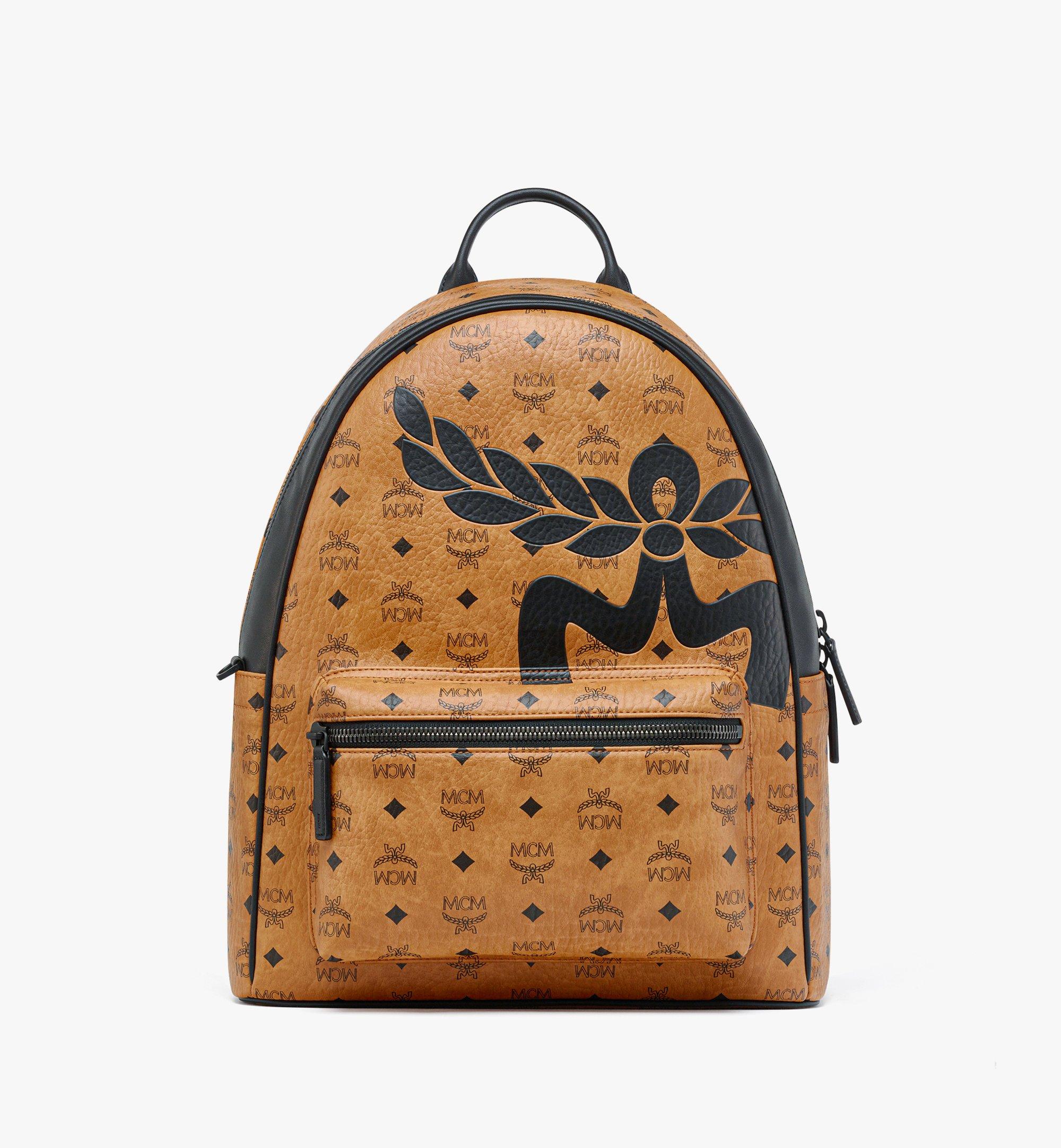 Mcm backpack sale black and gold