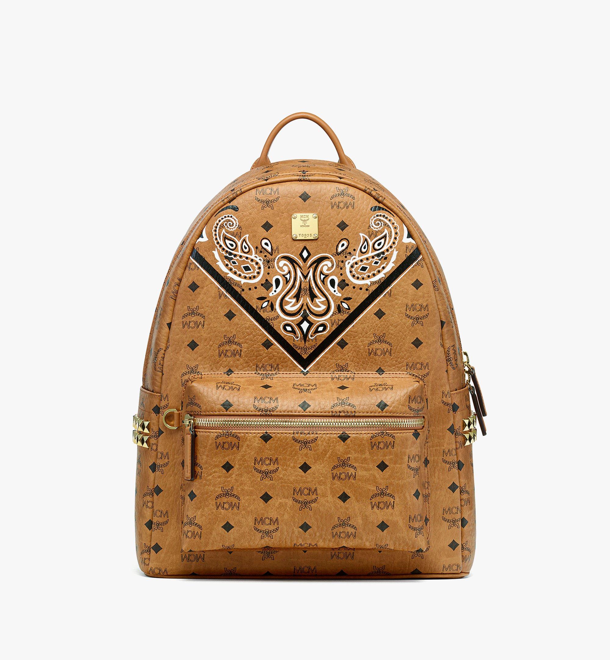 MCM メンス　テサゲカバン Medium Stark Side Studs Backpack in Bandana Visetos Cognac | MCM ®US