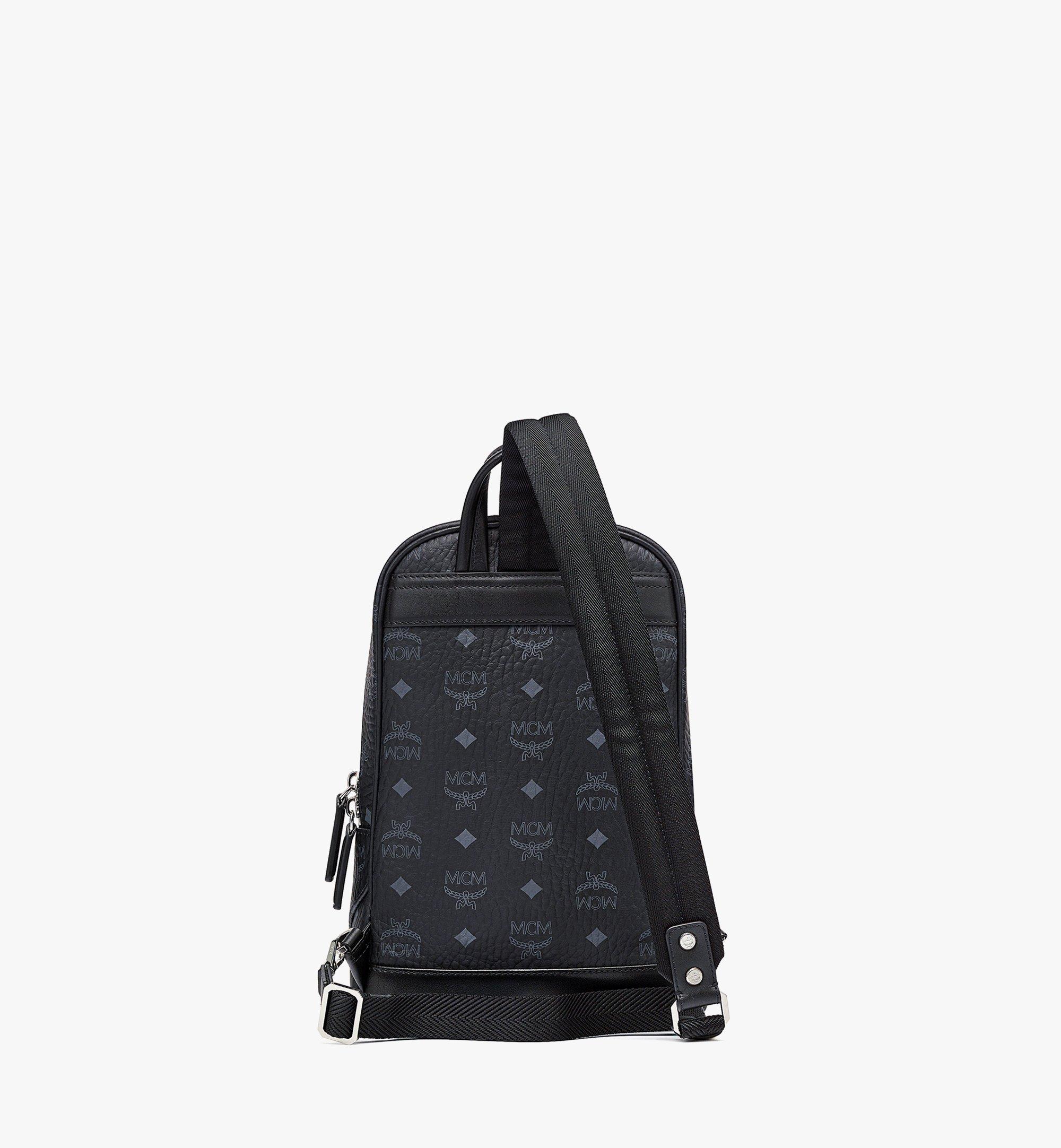 Mcm sling backpack sale