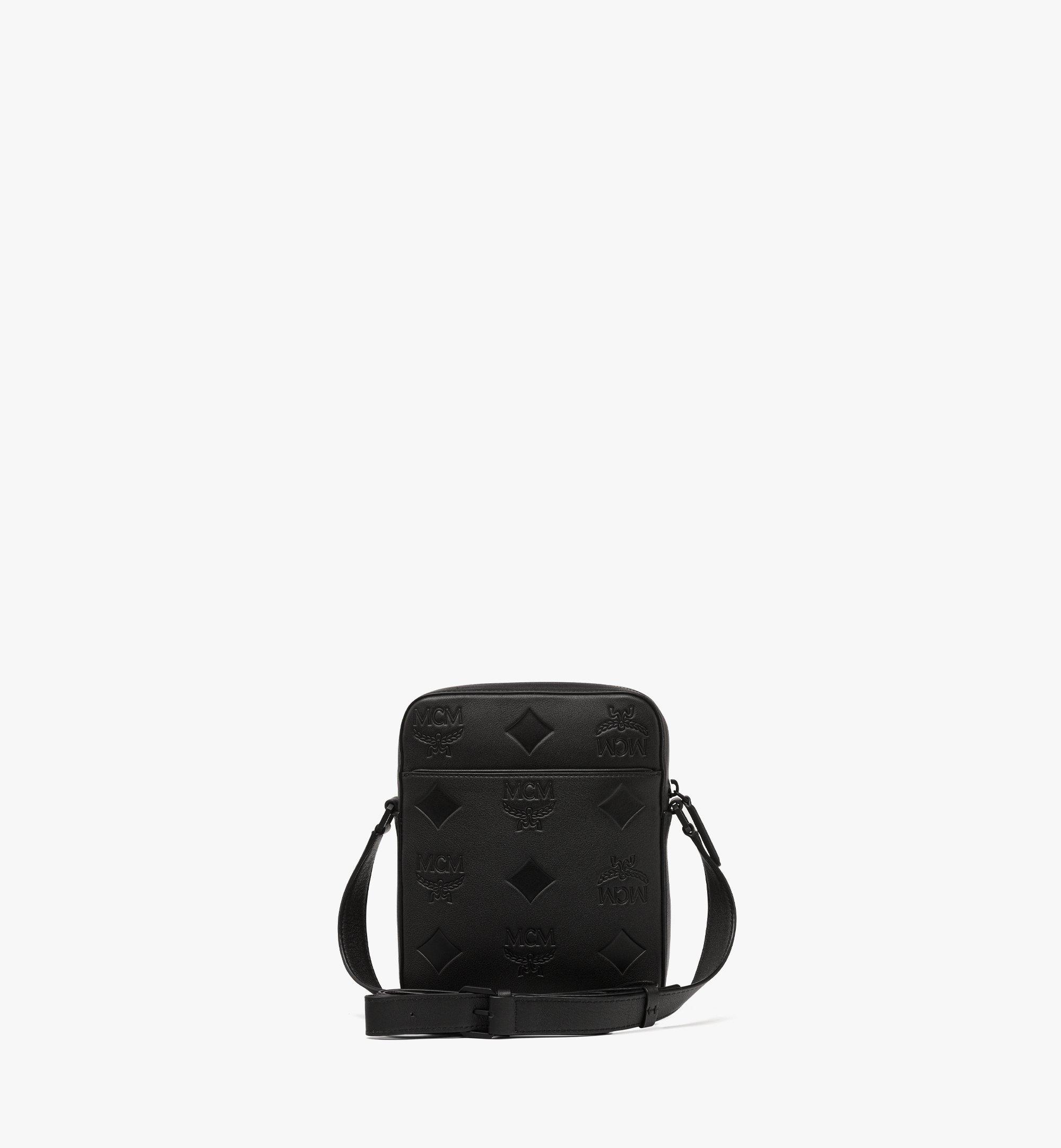 Black mcm 2025 crossbody bag