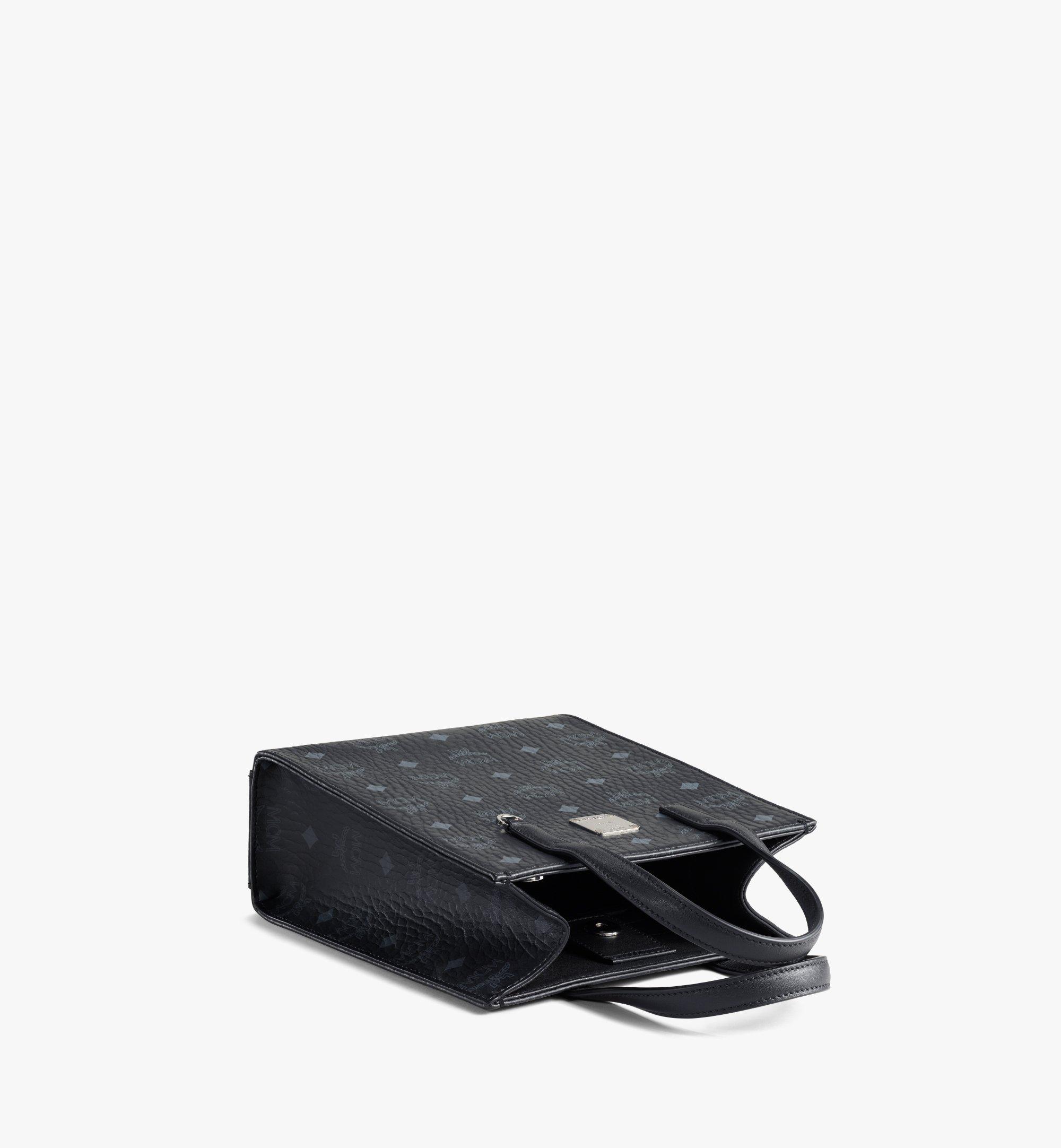 Black discount mcm wristlet