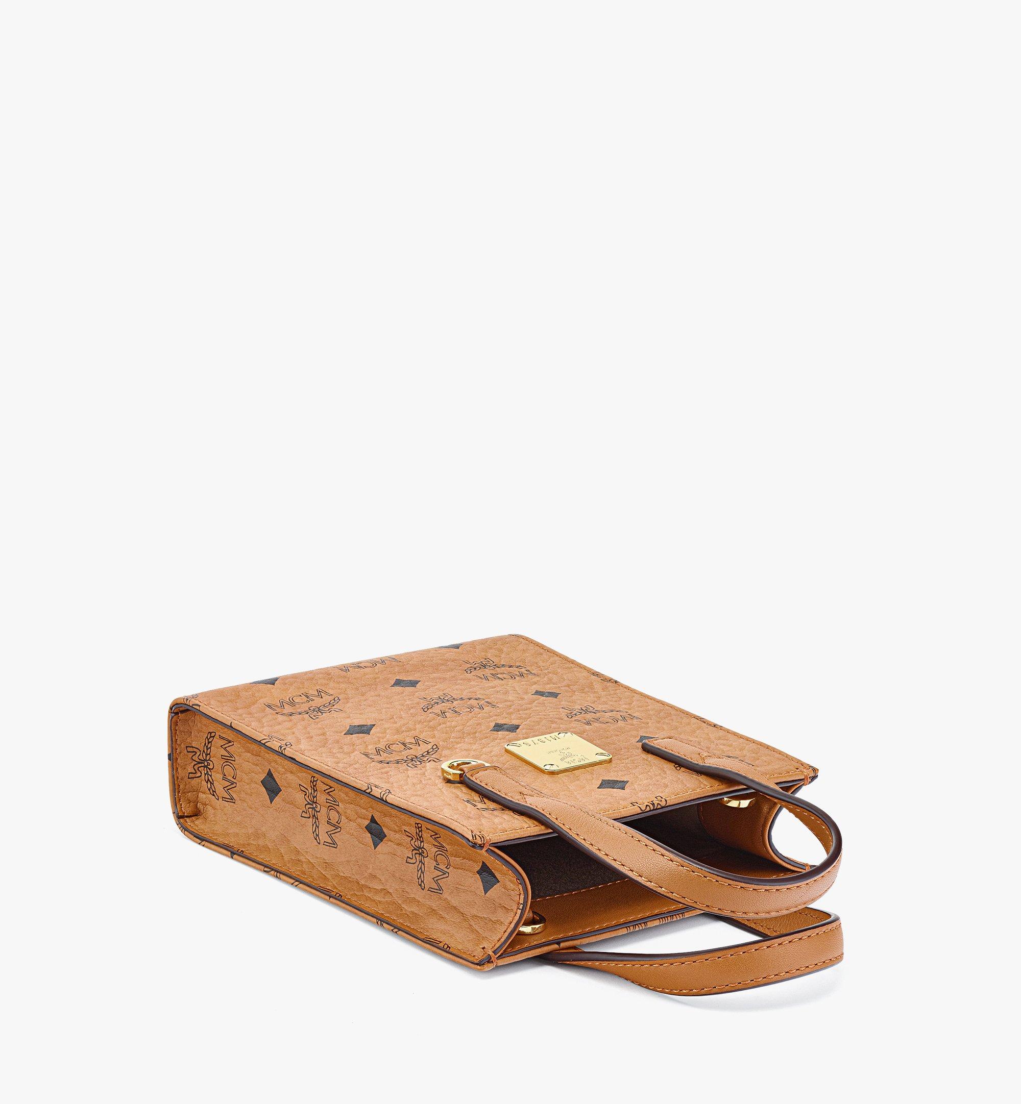 MCM Klassik Crossbody Bags in Visetos X-Mini Cognac