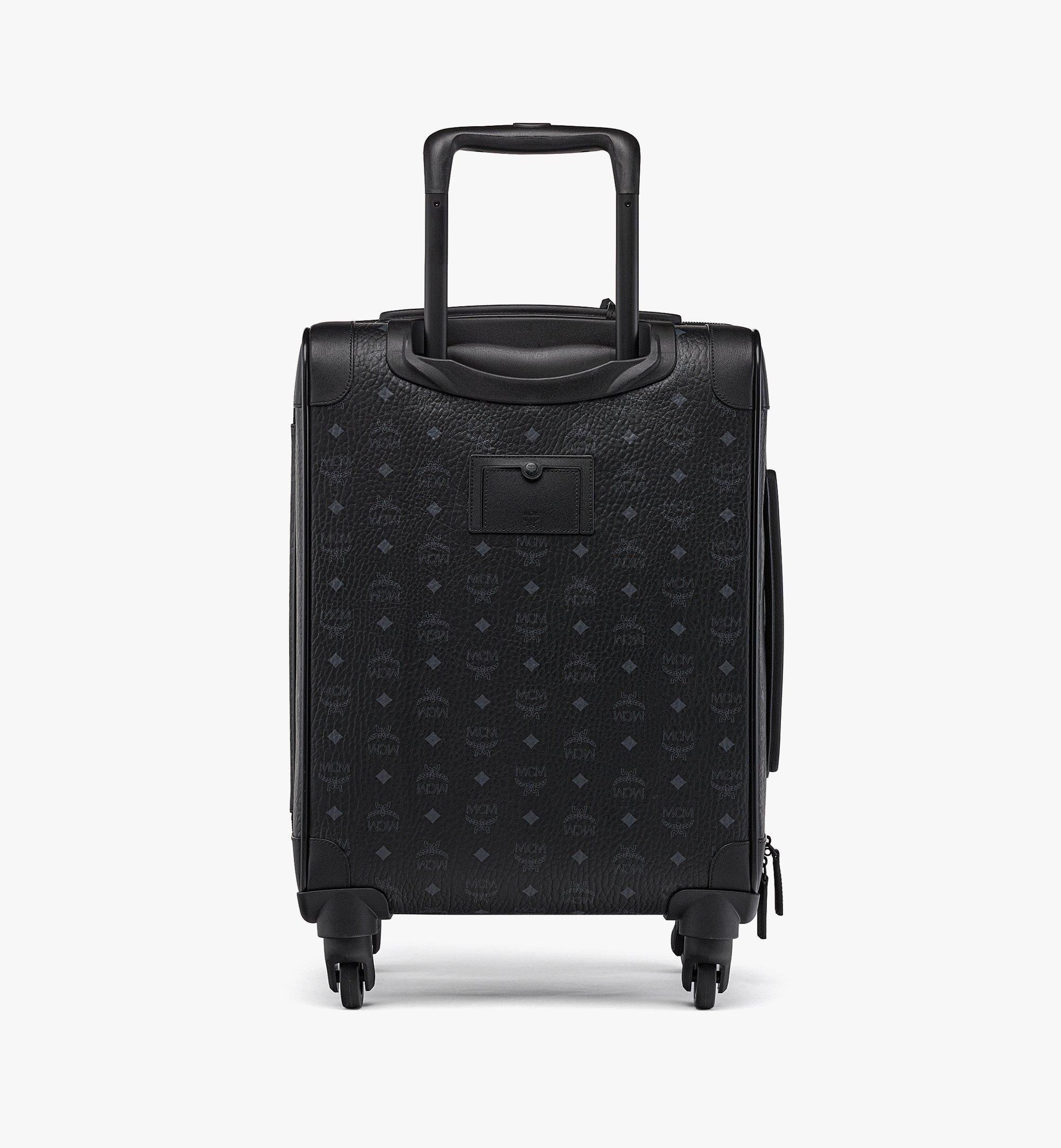 Mcm carry sales on luggage