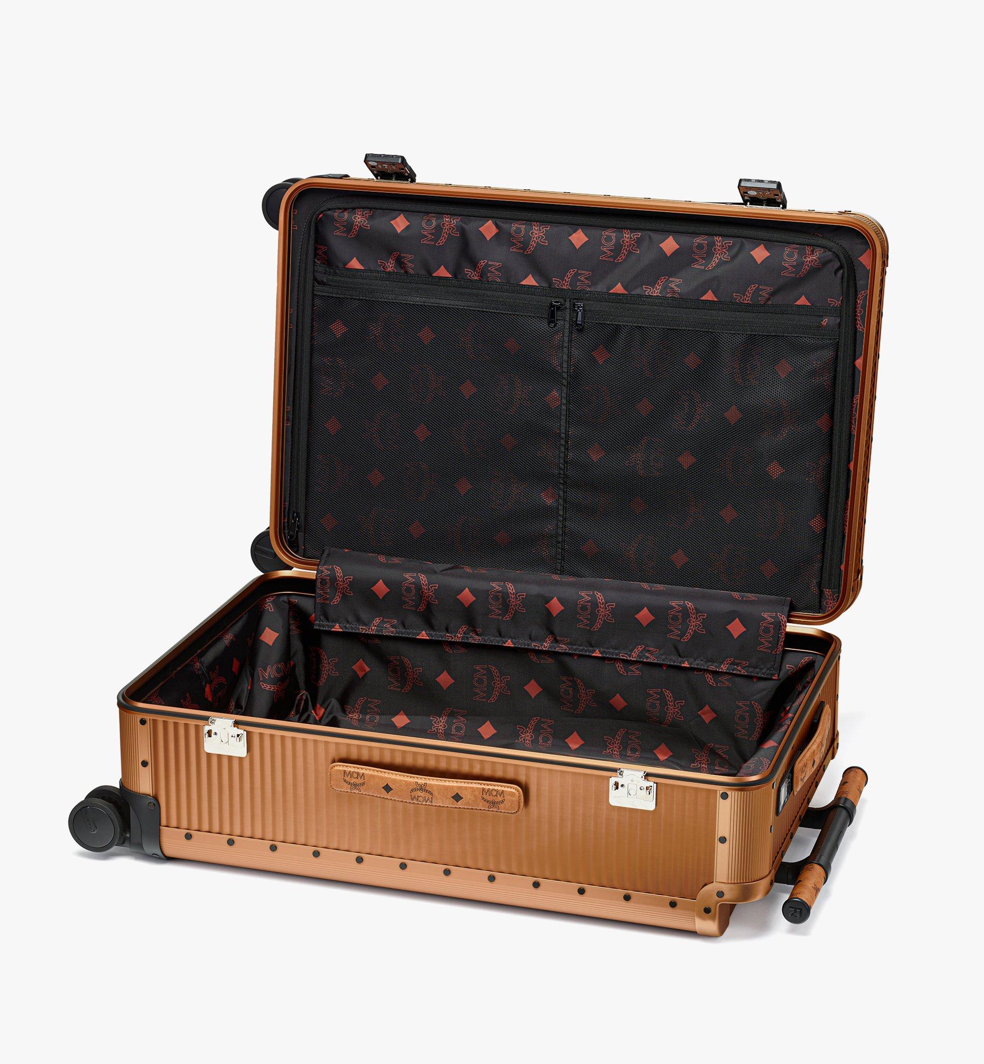 Large MCM X RAWROW Ottomar Check In Trolley MARS GOLD MCM ®JP