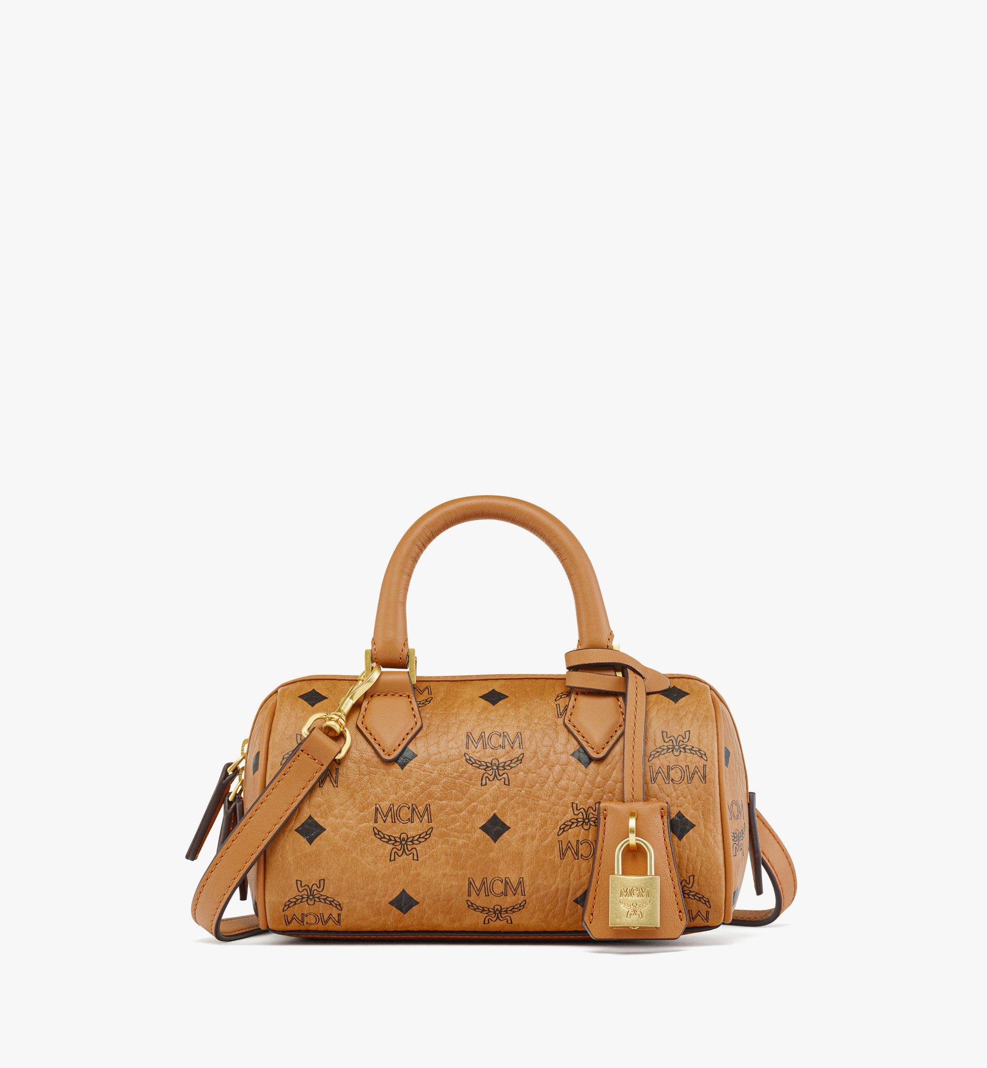 Mcm bookbag price new arrivals