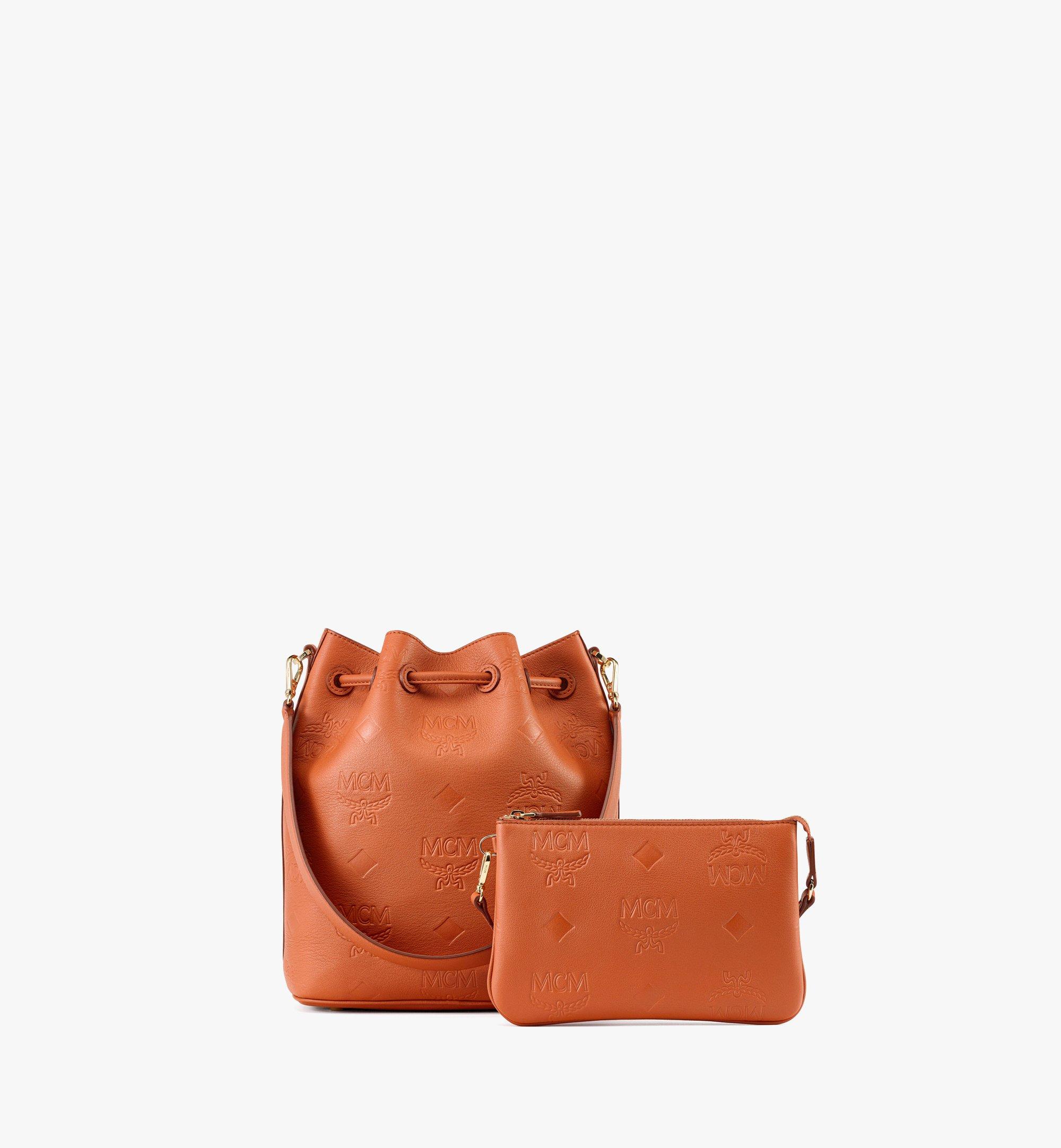 Mcm essential monogram leather best sale bucket bag