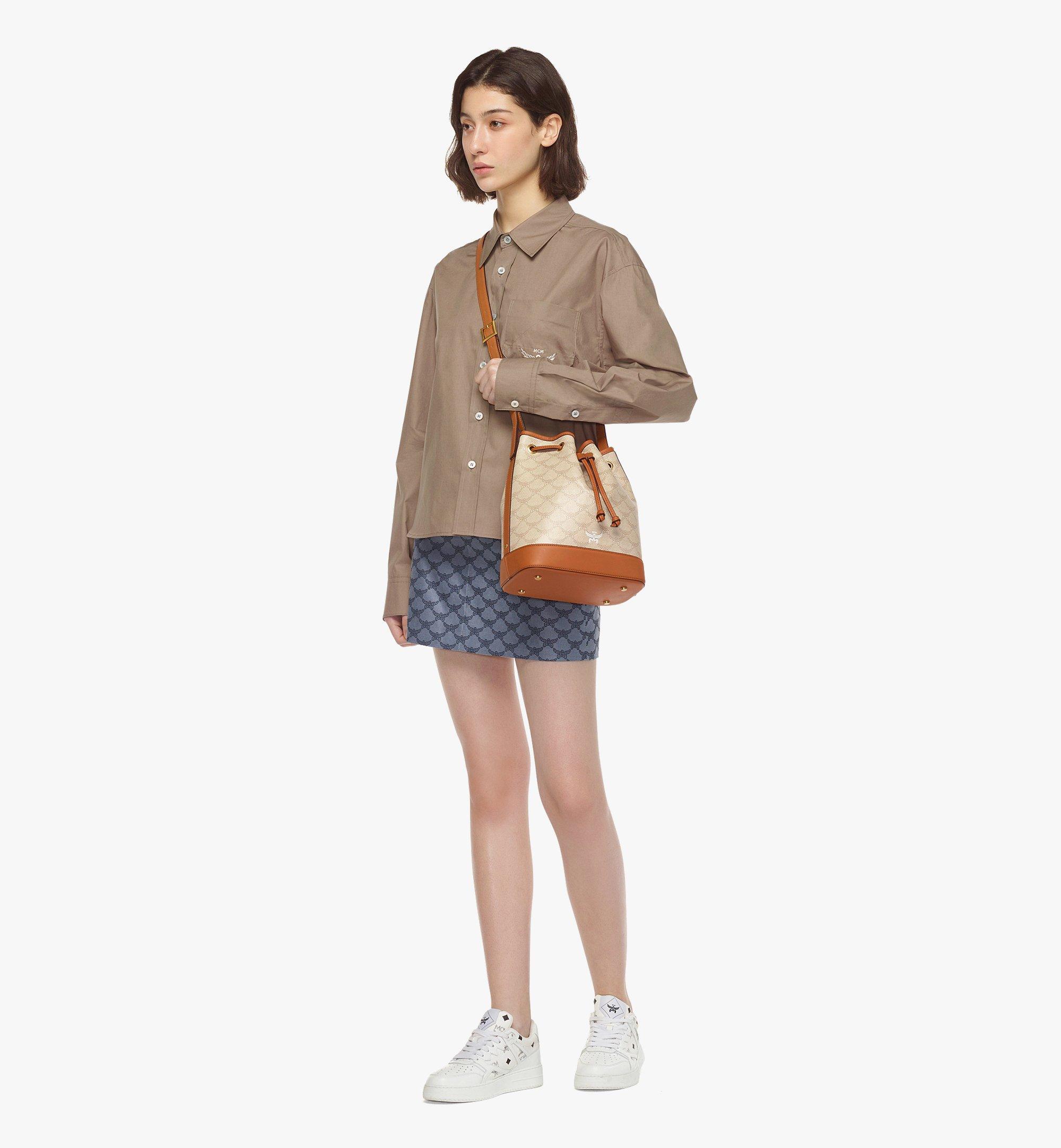 MCM :: LAURETOS DRAWSTRING バケットバッグ Medium Himmel Drawstring Bag in Lauretos Gold | MCM ®US