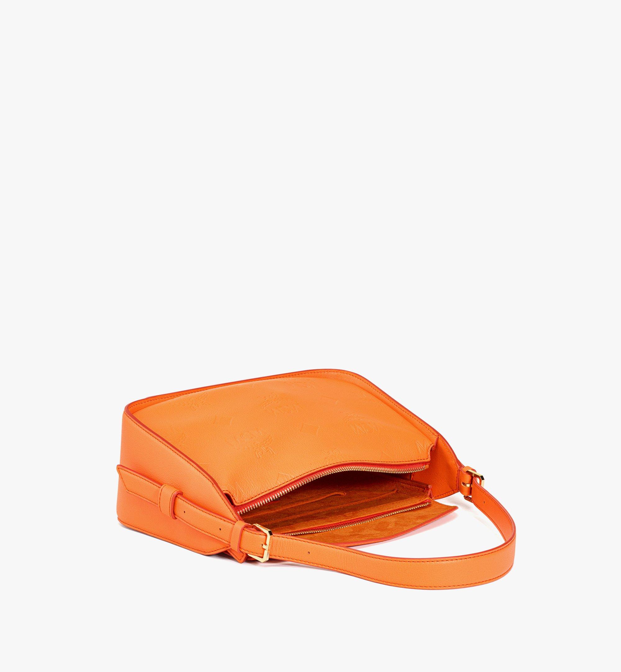 MCM Aren フラップ ホーボーバッグ - モノグラムエンボスレザー Orange MWHDSTA03O0001 ほかの角度から見る 2