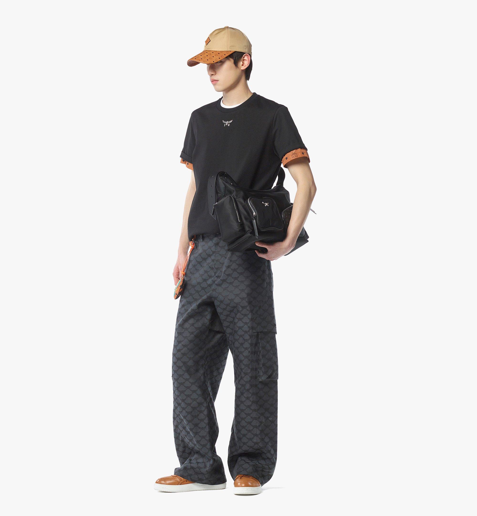MCM Aren Hobo aus ECONYL® und Leder mit Monogramm-Print und Reissverschluss Black MWHFATA01BK001 Noch mehr sehen 5