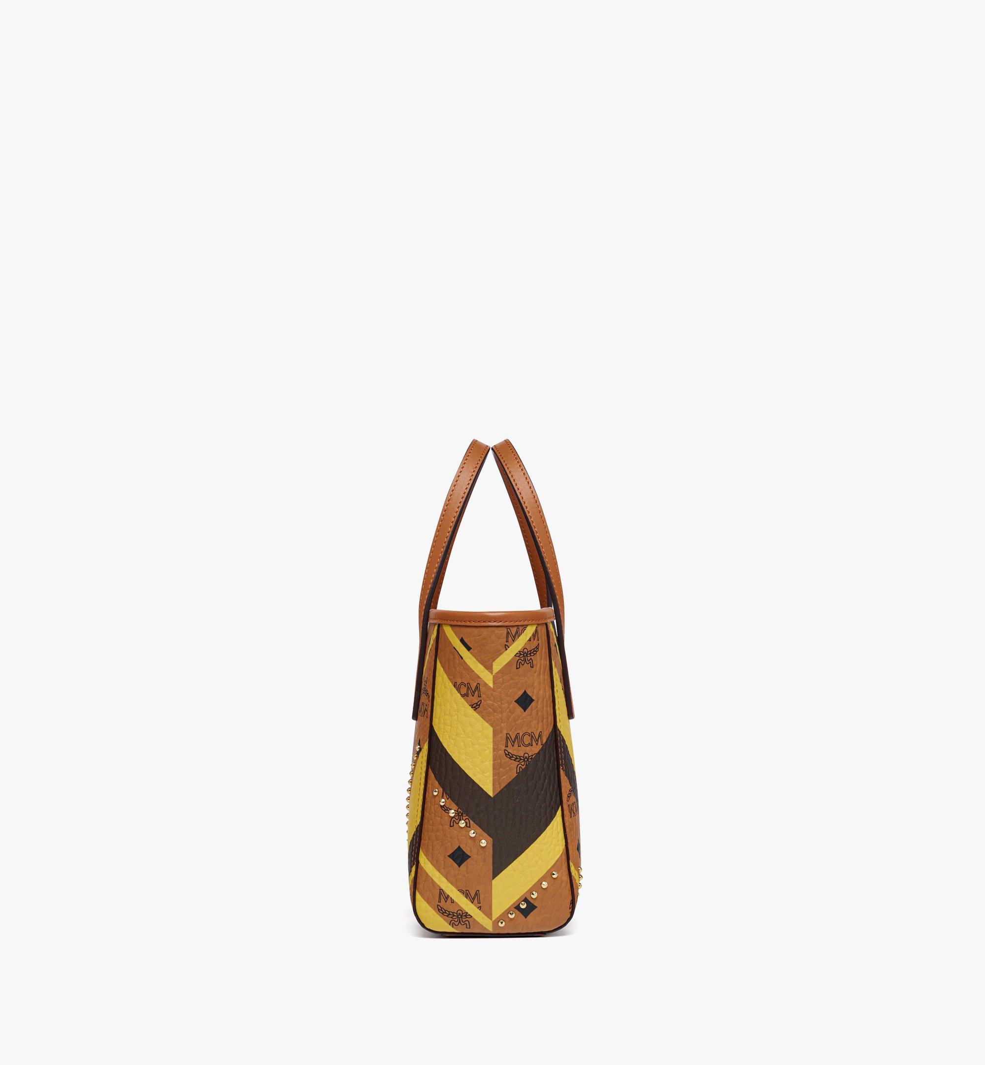 MCM Studded Toni Top-Zip Shopper in Mega Herringbone Visetos Cognac MWPFAMT01CO001 Alternate View 1