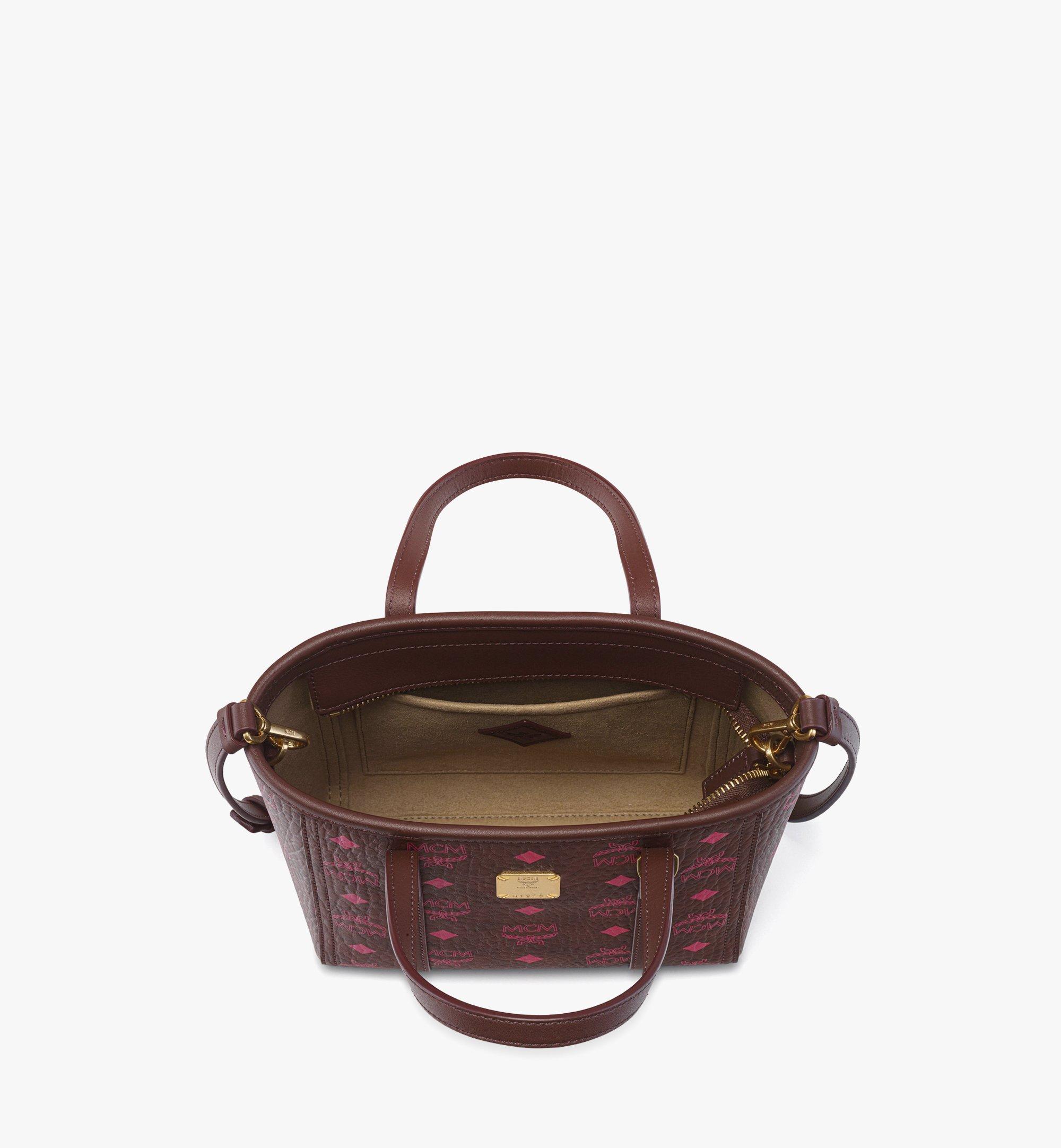 MCM ブラウンレザーショルダーバッグMini TONI トップジップショッパー X-Mini Toni Top-Zip Shopper in Visetos Cognac | MCM ®US