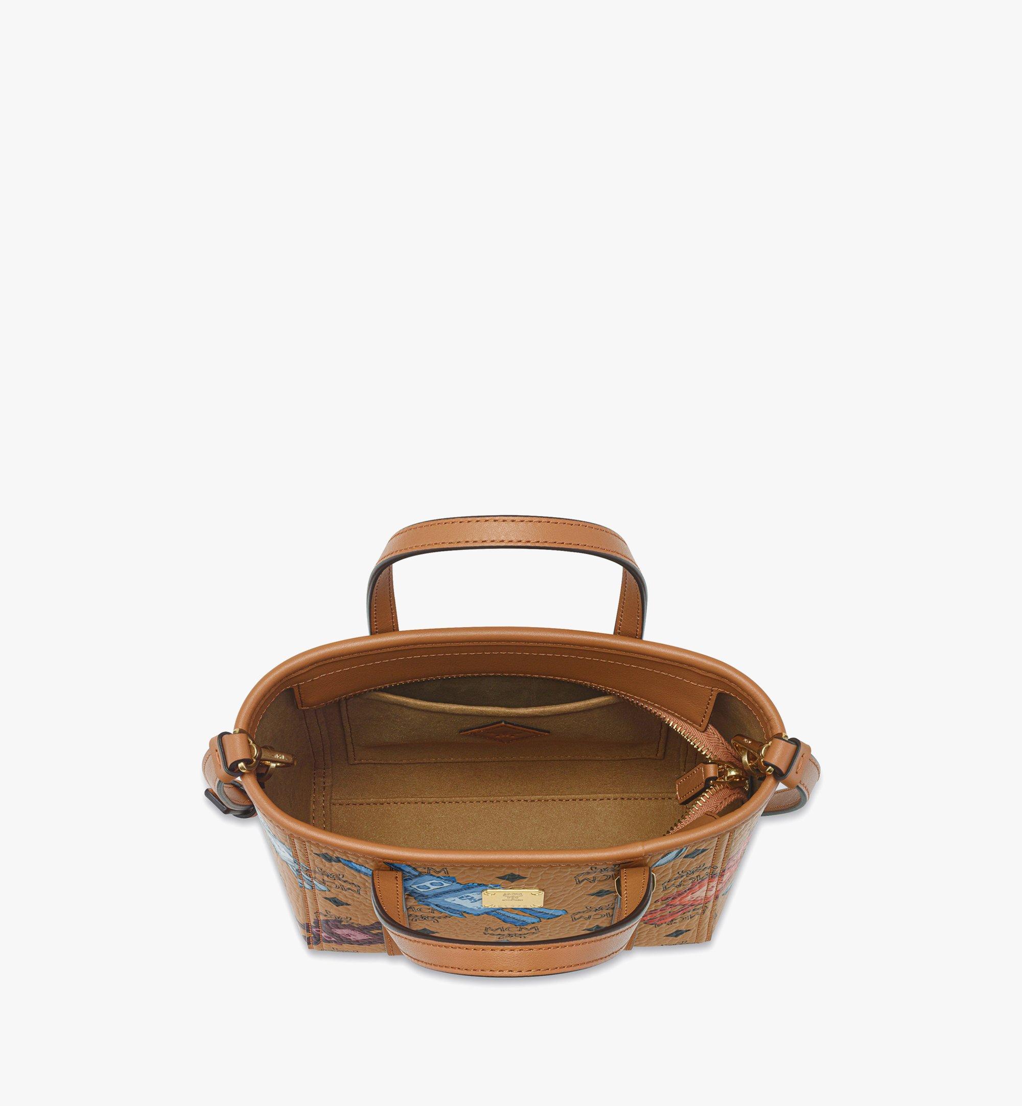 MCM ブラウンレザーショルダーバッグMini TONI トップジップショッパー Mini Toni Top-Zip Shopper in Visetos Brown | MCM ®US
