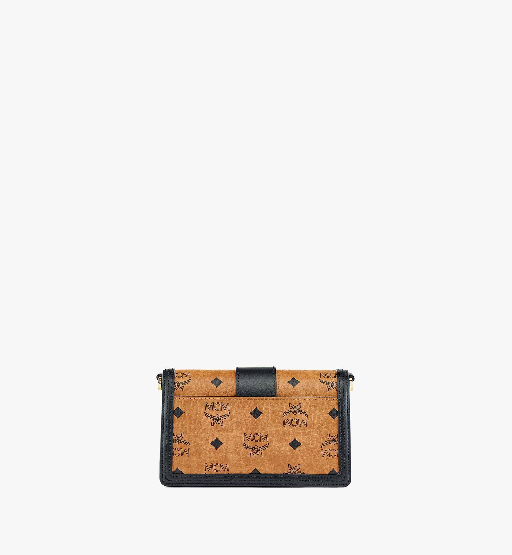 Mcm best sale gold crossbody