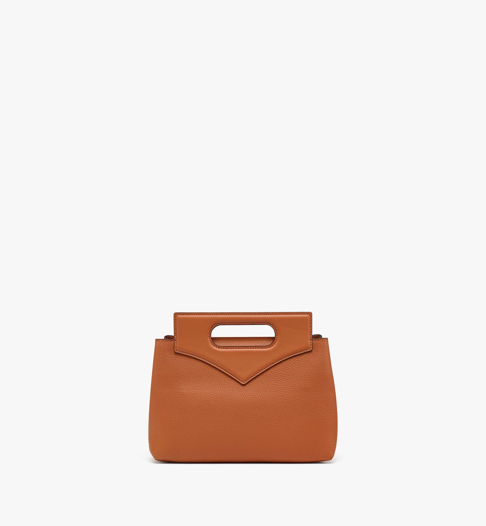 Orange mcm bag best sale