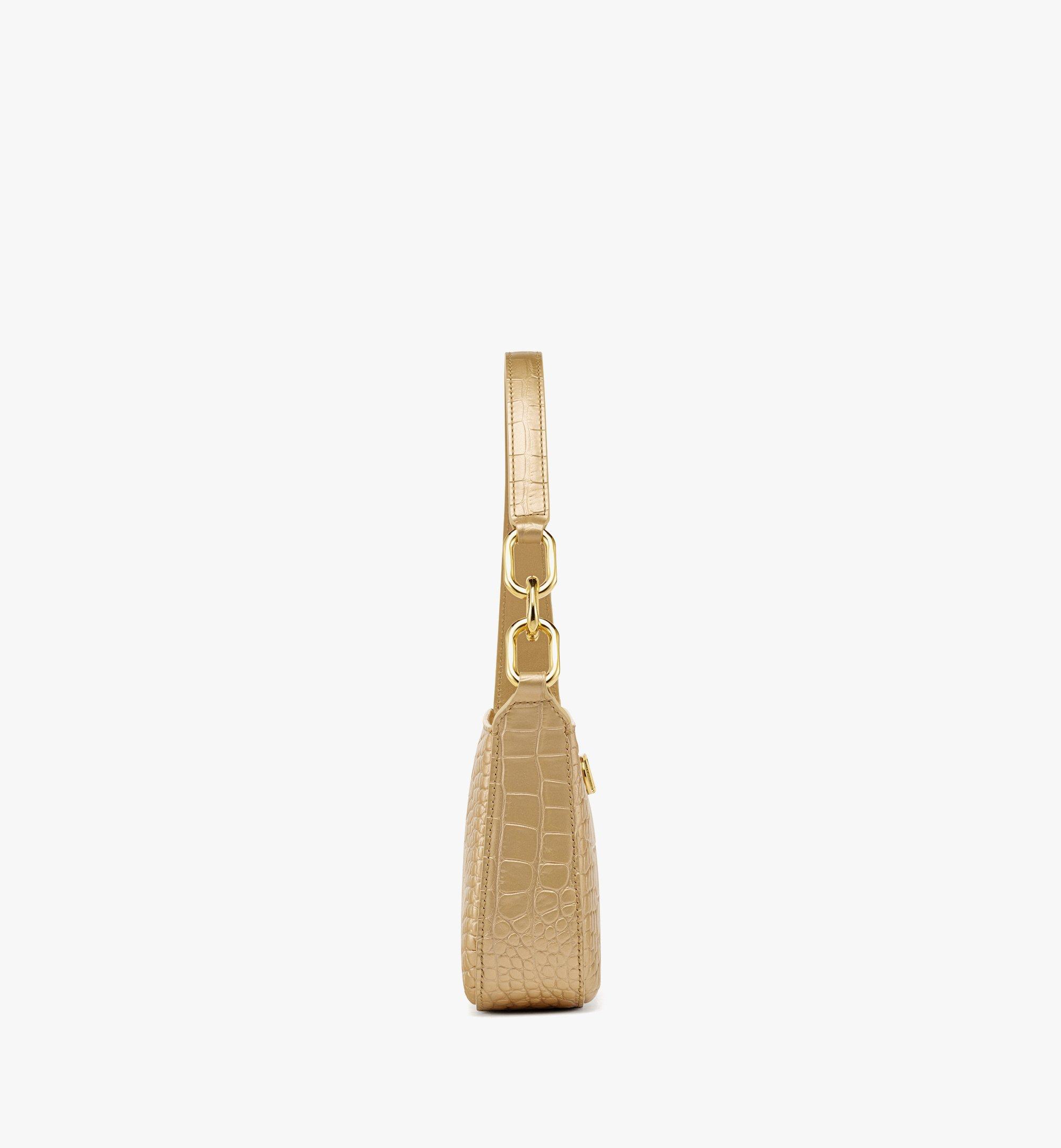 MCM Mode Travia Schultertasche aus goldenem Leder mit Kroko-Prägung Gold MWSDSLD01DG001 Noch mehr sehen 1