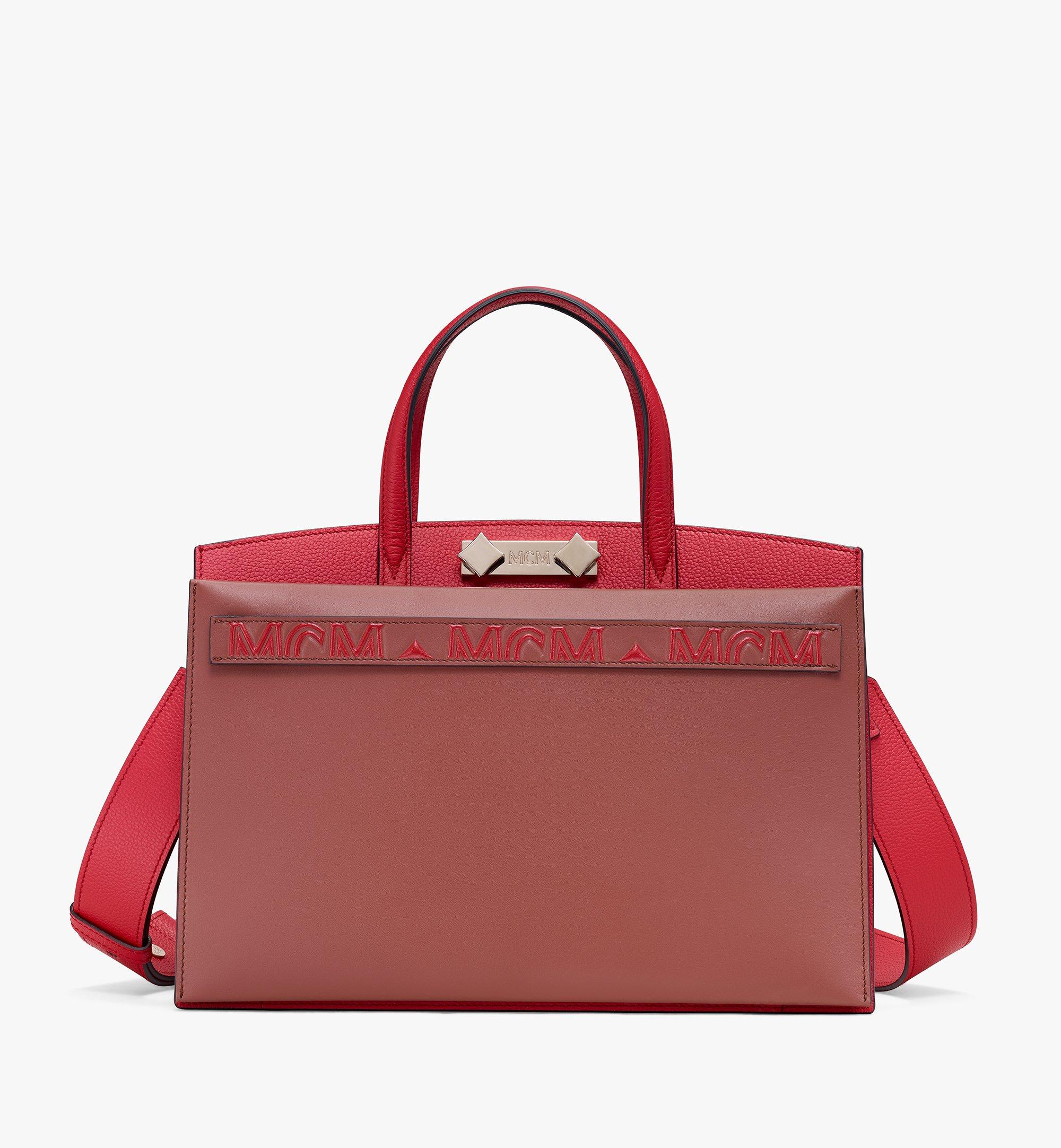 red mcm tote bag