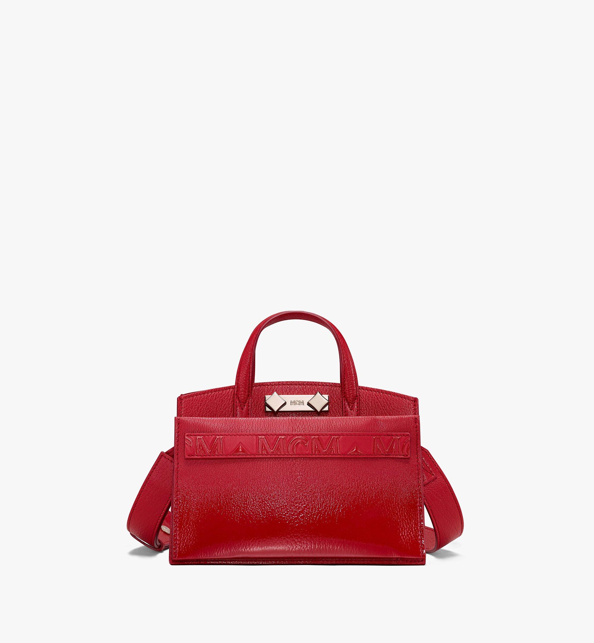 red mcm tote bag