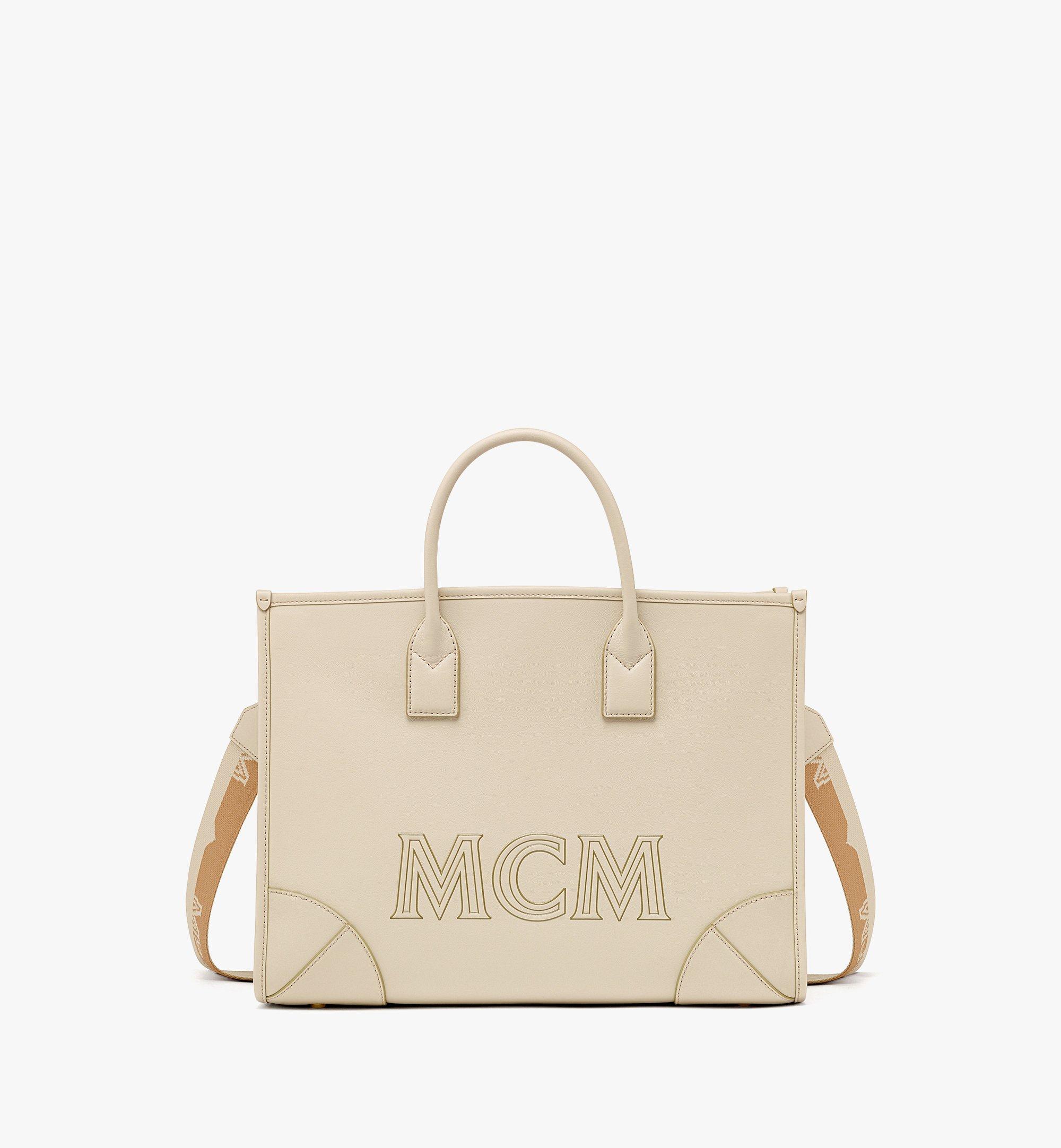 美品 MCM レザー ショルダー バッグ 筒形 ロゴ 総柄 ゴールド 金具 黒