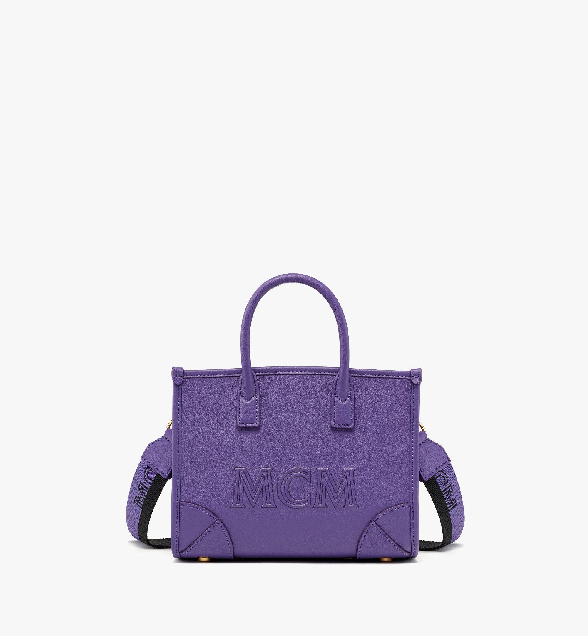 purple mcm purse