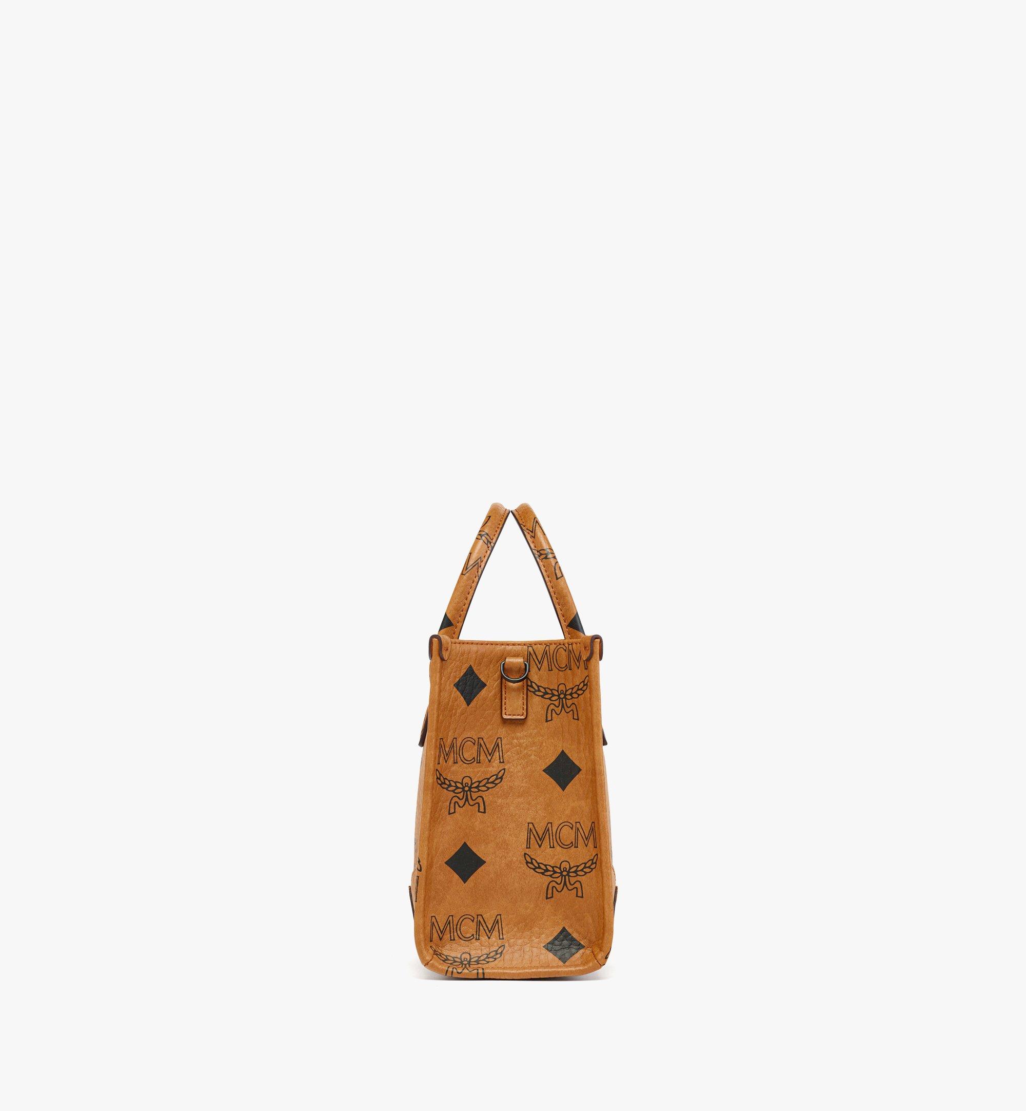 MCM Monogram Print Sling Bag in Brown for Men