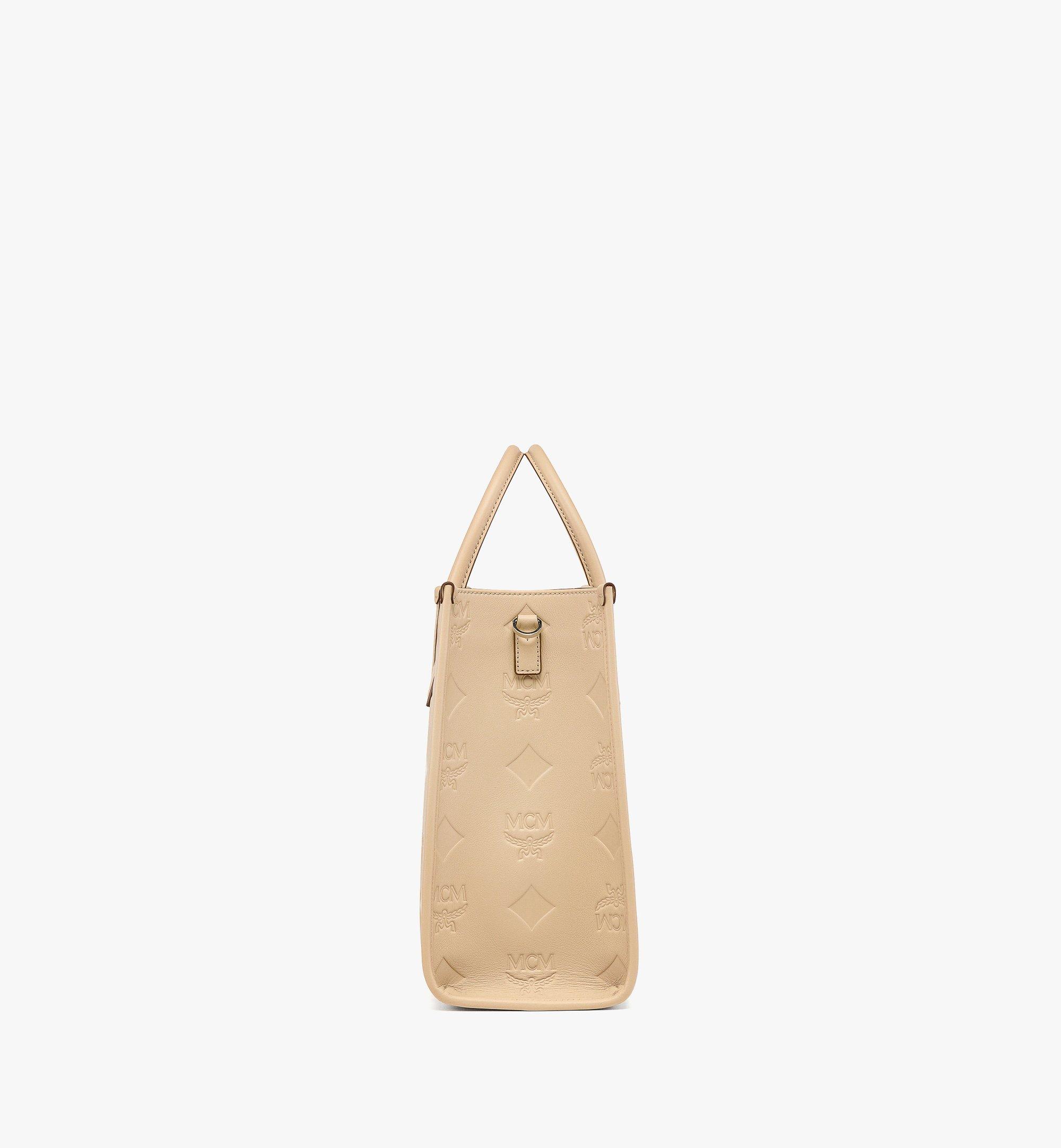 MCM กระเป๋าโท้ท München ทำจากหนังแก้วลายโมโนแกรม Maxi Beige MWTDABO14I7001 มุมมองอื่น 1