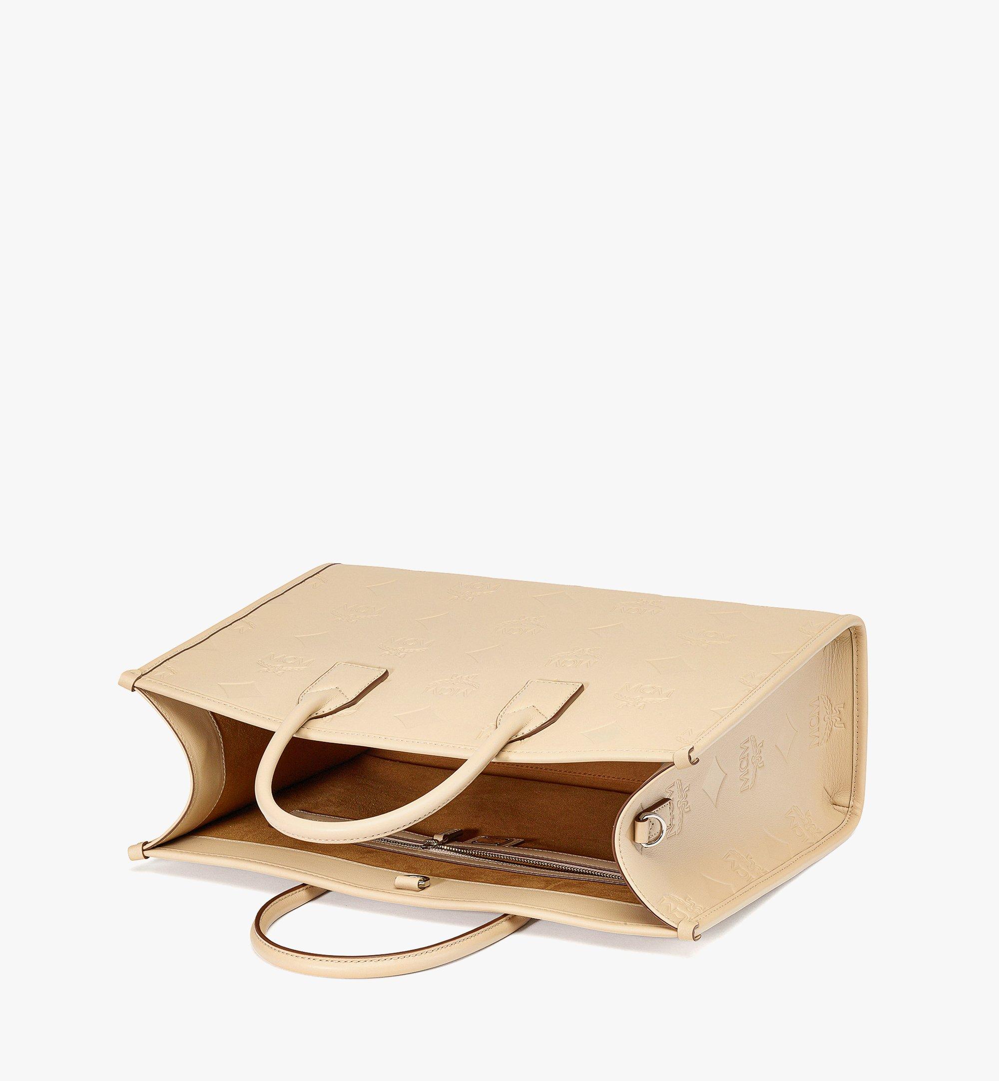 MCM München トートバッグ - マキシモノグラムレザー Beige MWTDABO14I7001 ほかの角度から見る 2