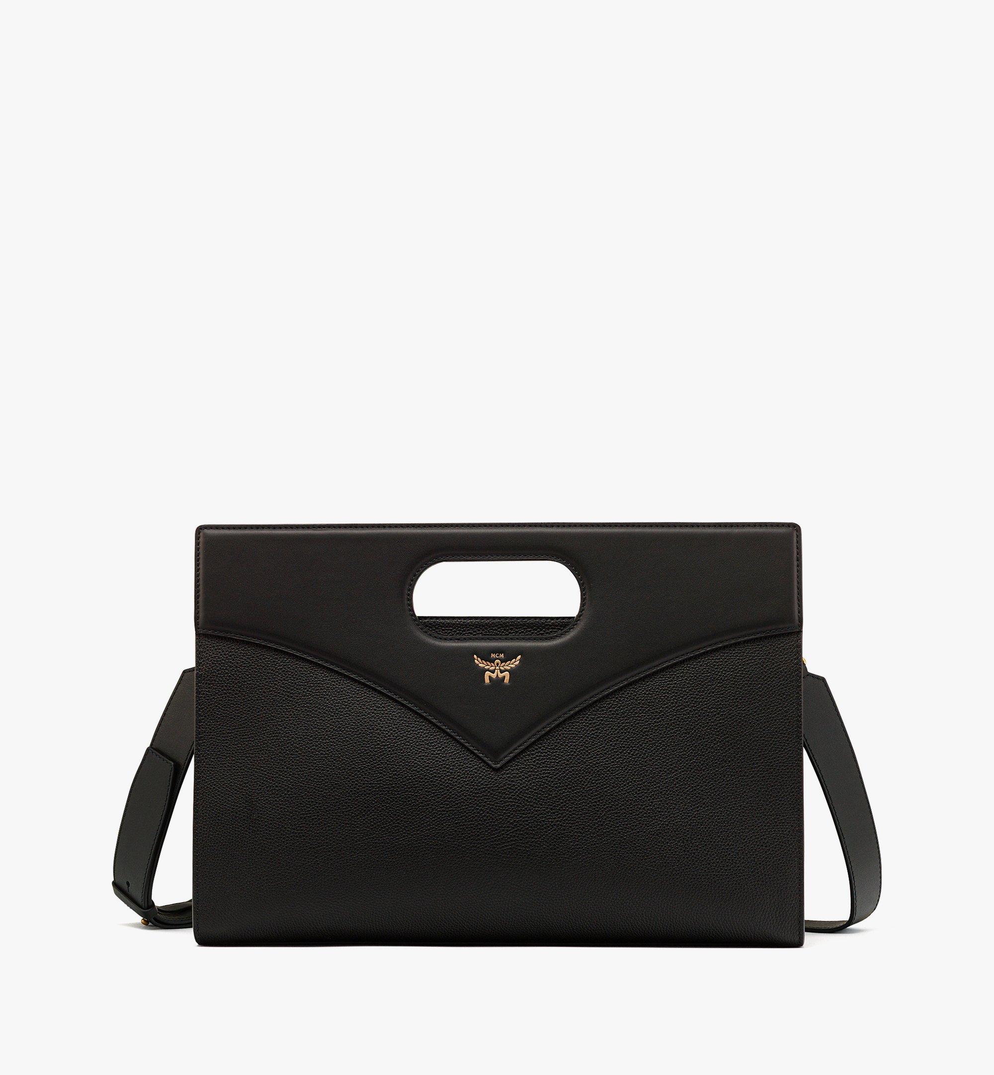 Mcm black clutch online bag