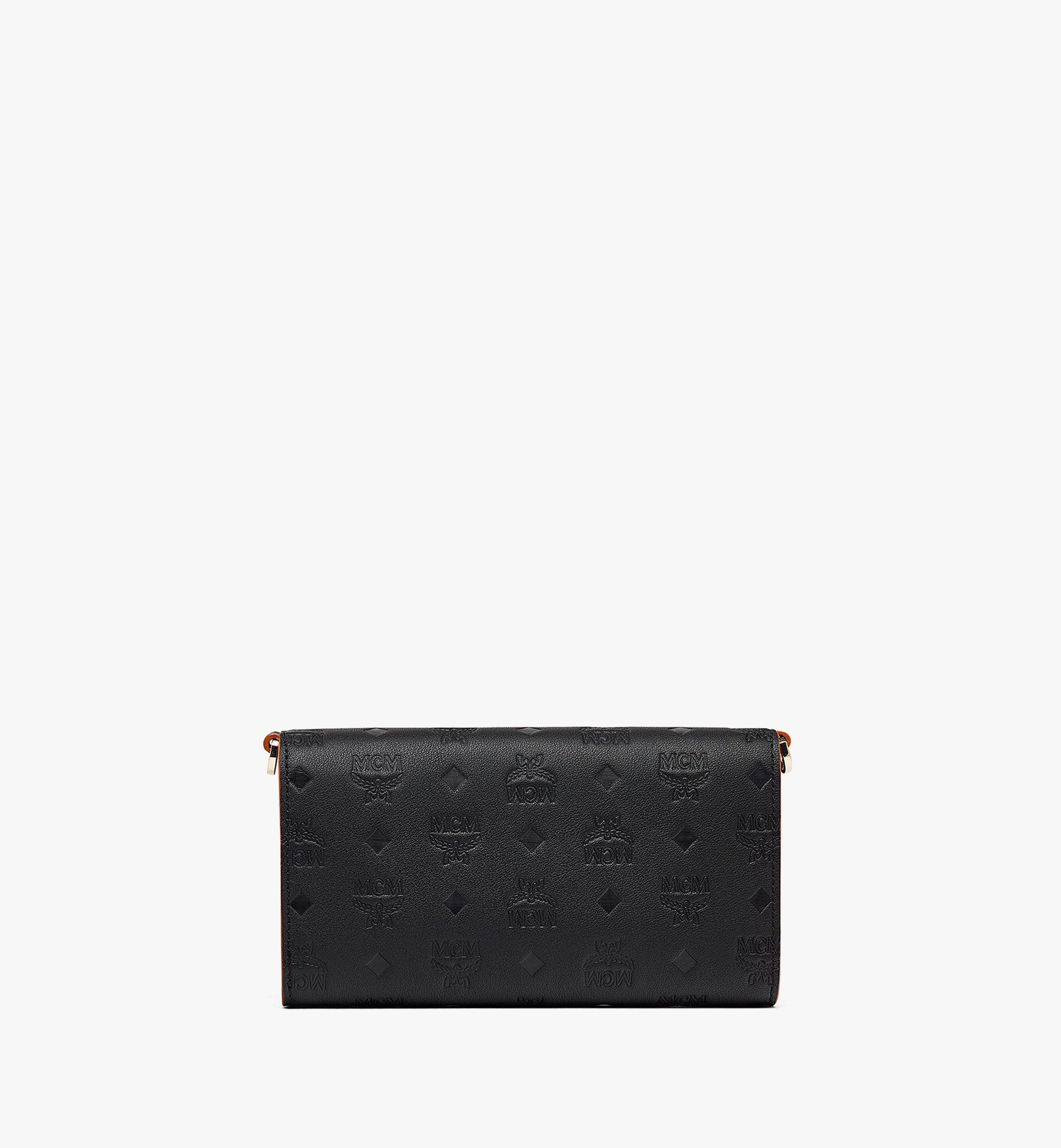 MCM Aren Chain Zip Around Wallet In Embossed Monogram Leather in Orange