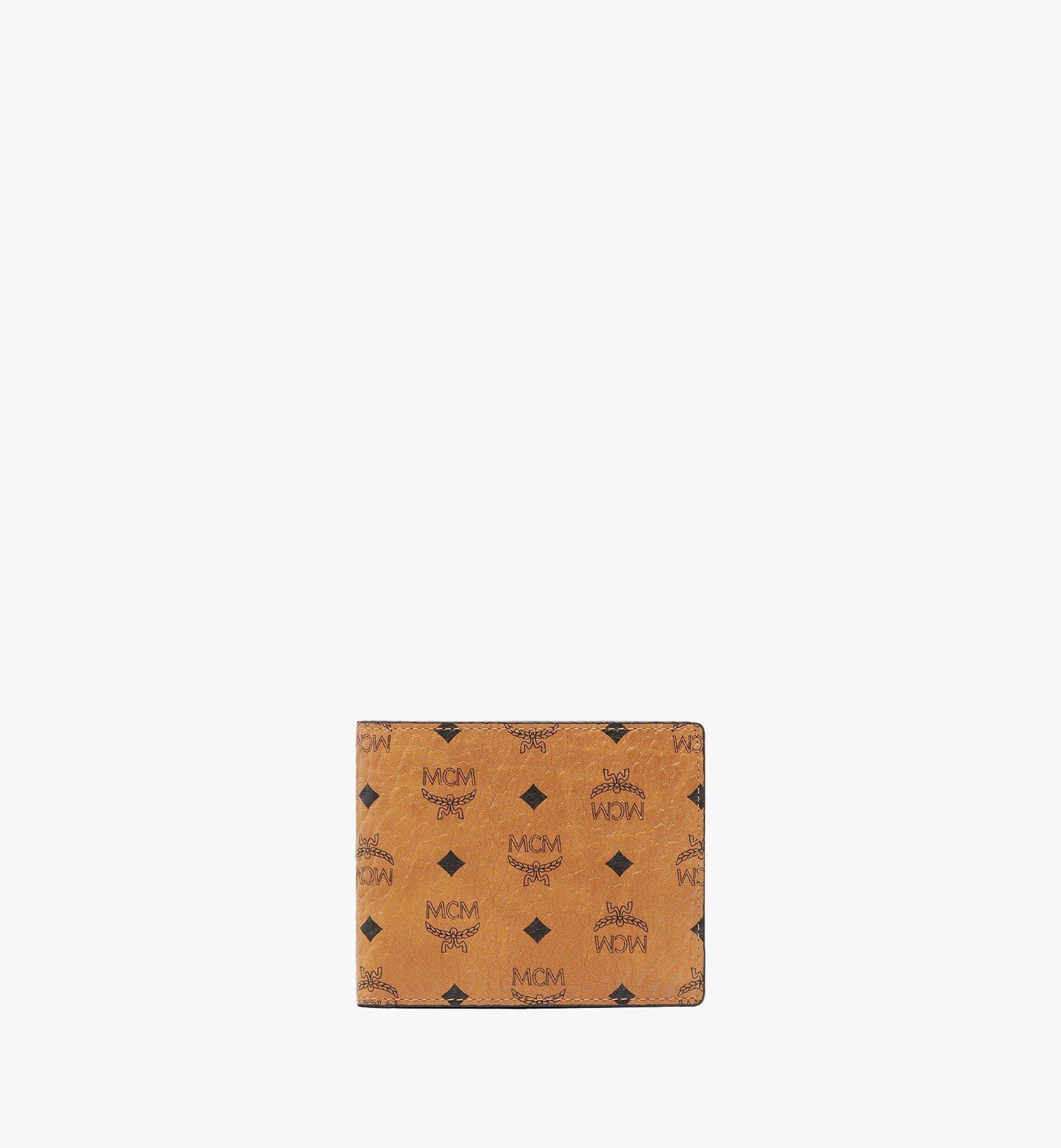 MCM Claus Bifold Wallet – SECONDHAND LUXURY LLC