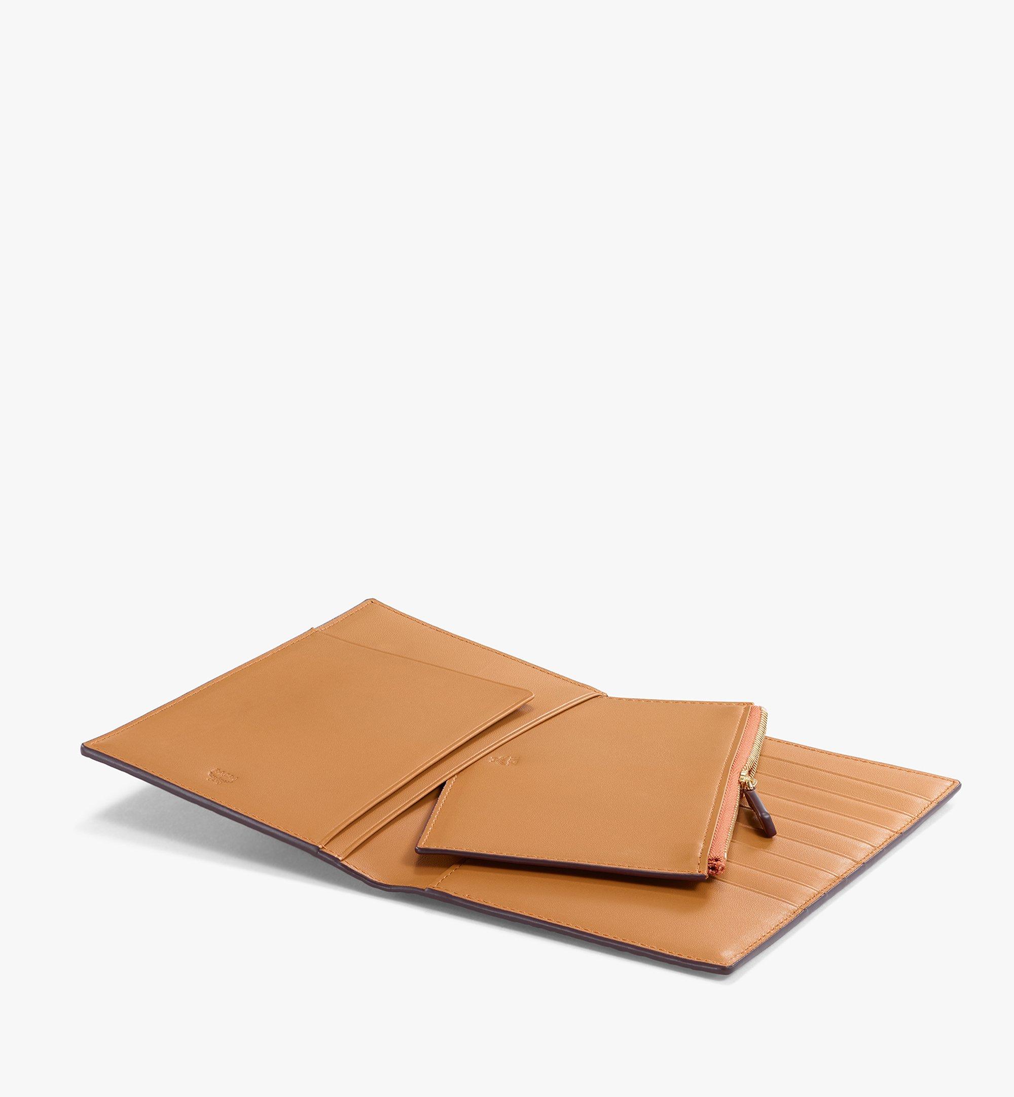 Mcm passport holder discount sale