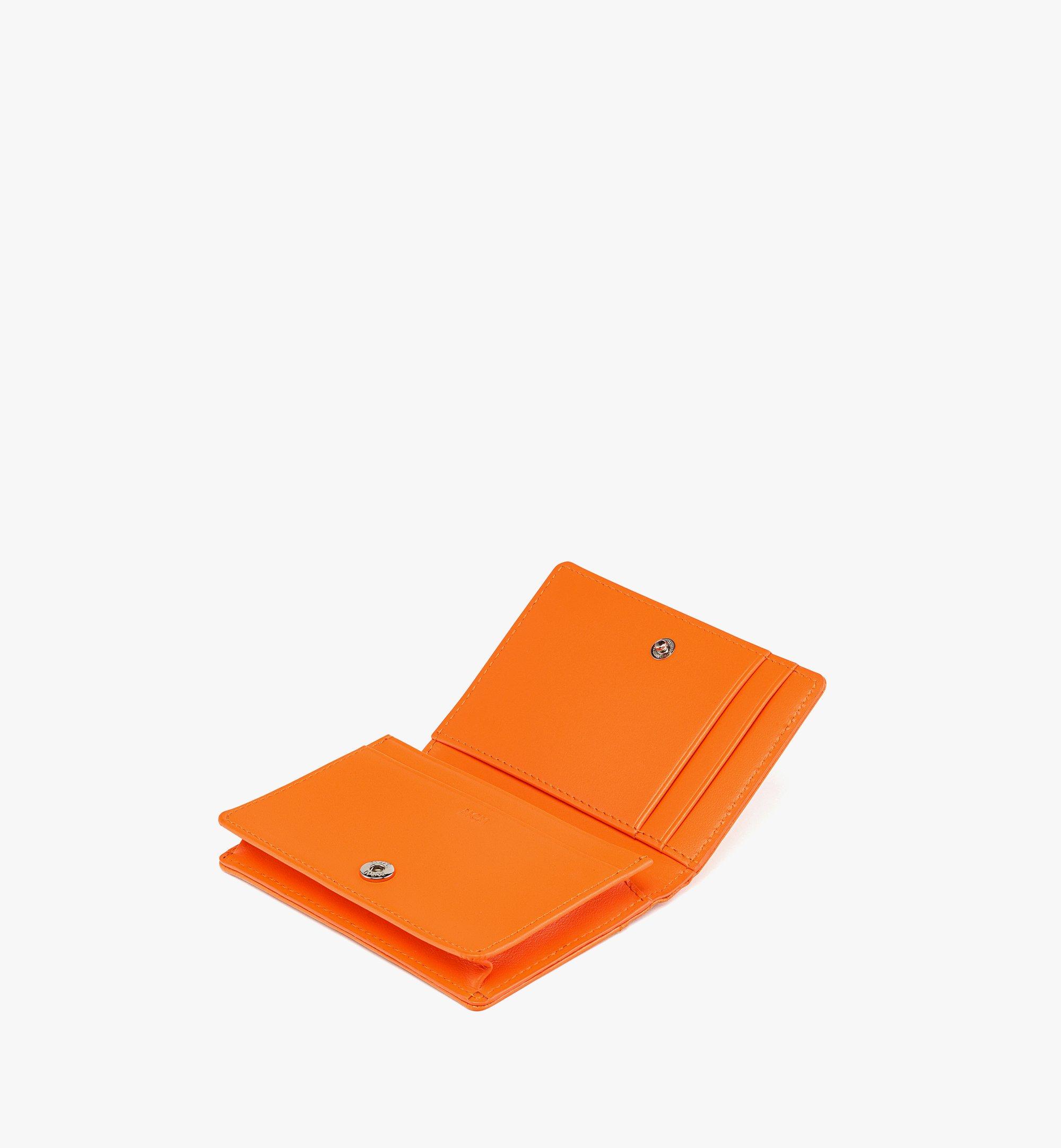 MCM Travia Kartenetui aus gestepptem Knautschleder mit Kettenriemen Orange MYADALM01O0001 Noch mehr sehen 1