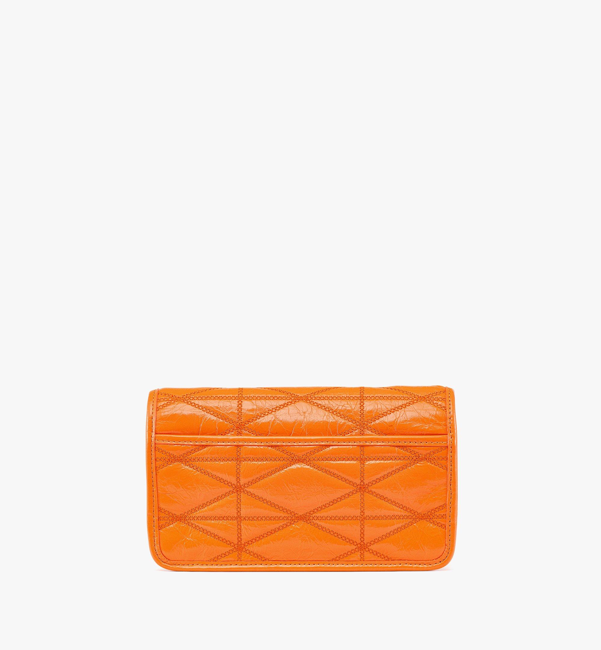 Large Travia Quilted Chain Wallet in Crushed Leather Orange MCM ®US