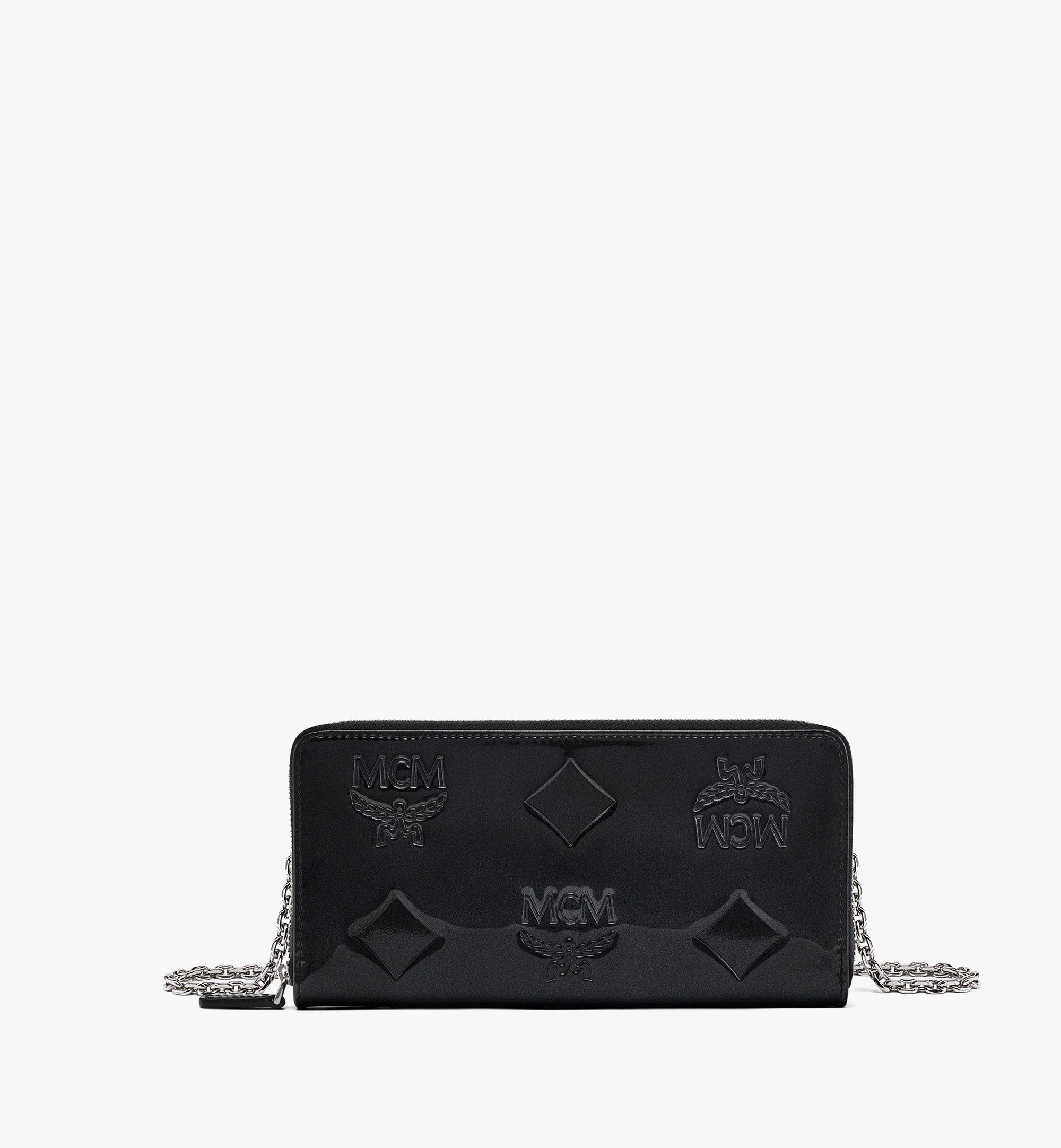 Mcm Klara Embossed Leather Crossbody In Black/cognac