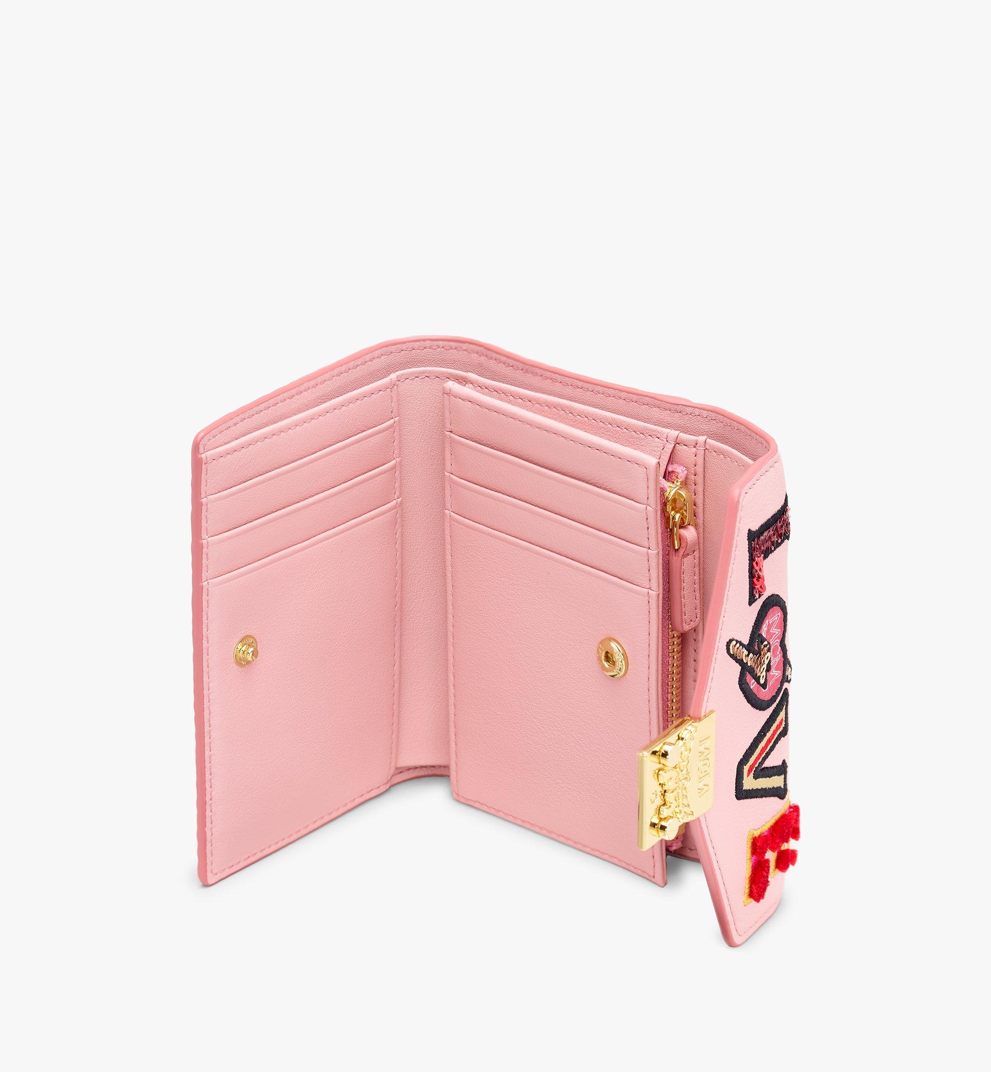 Mcm hotsell wallet pink